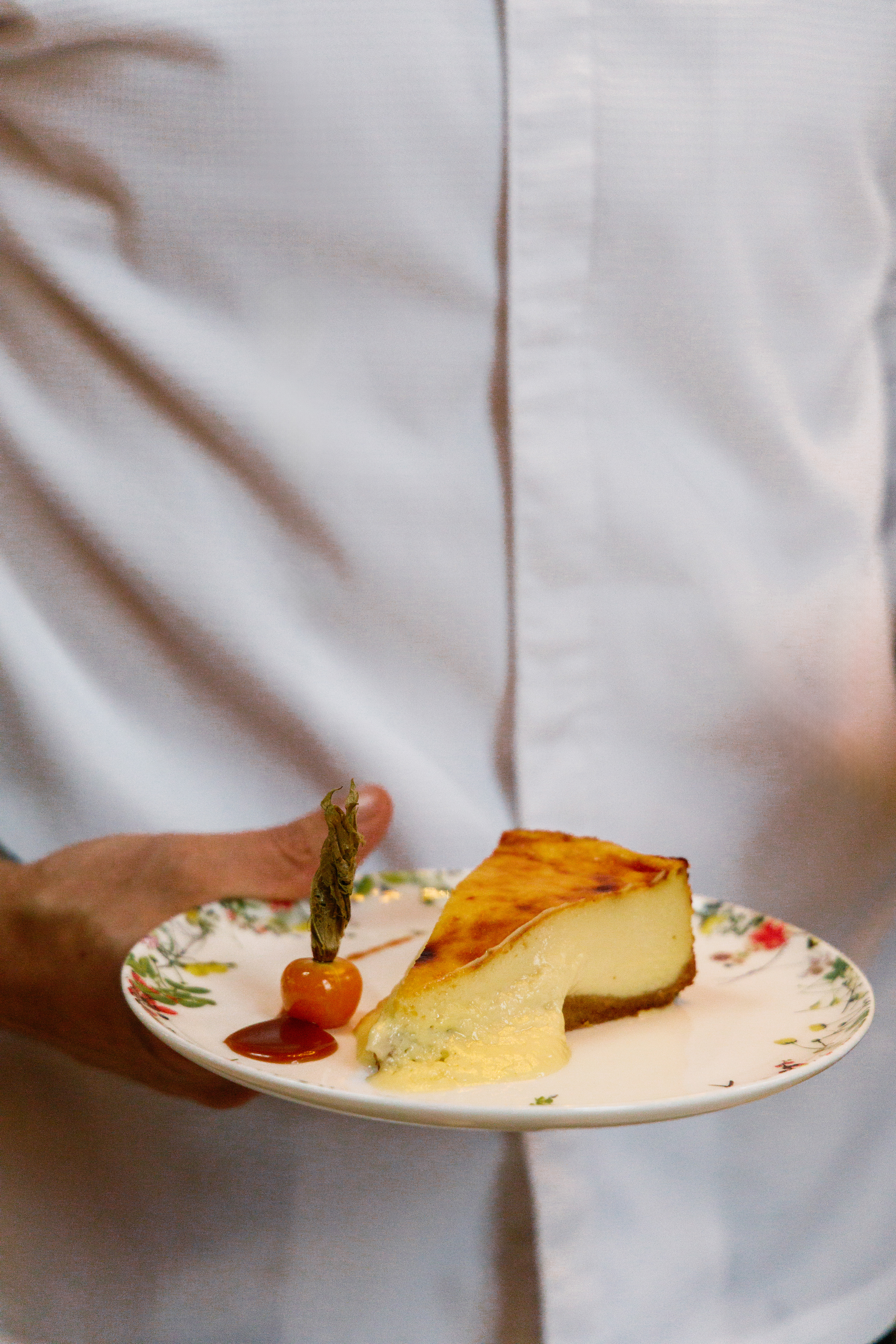 a person holding a plate of food