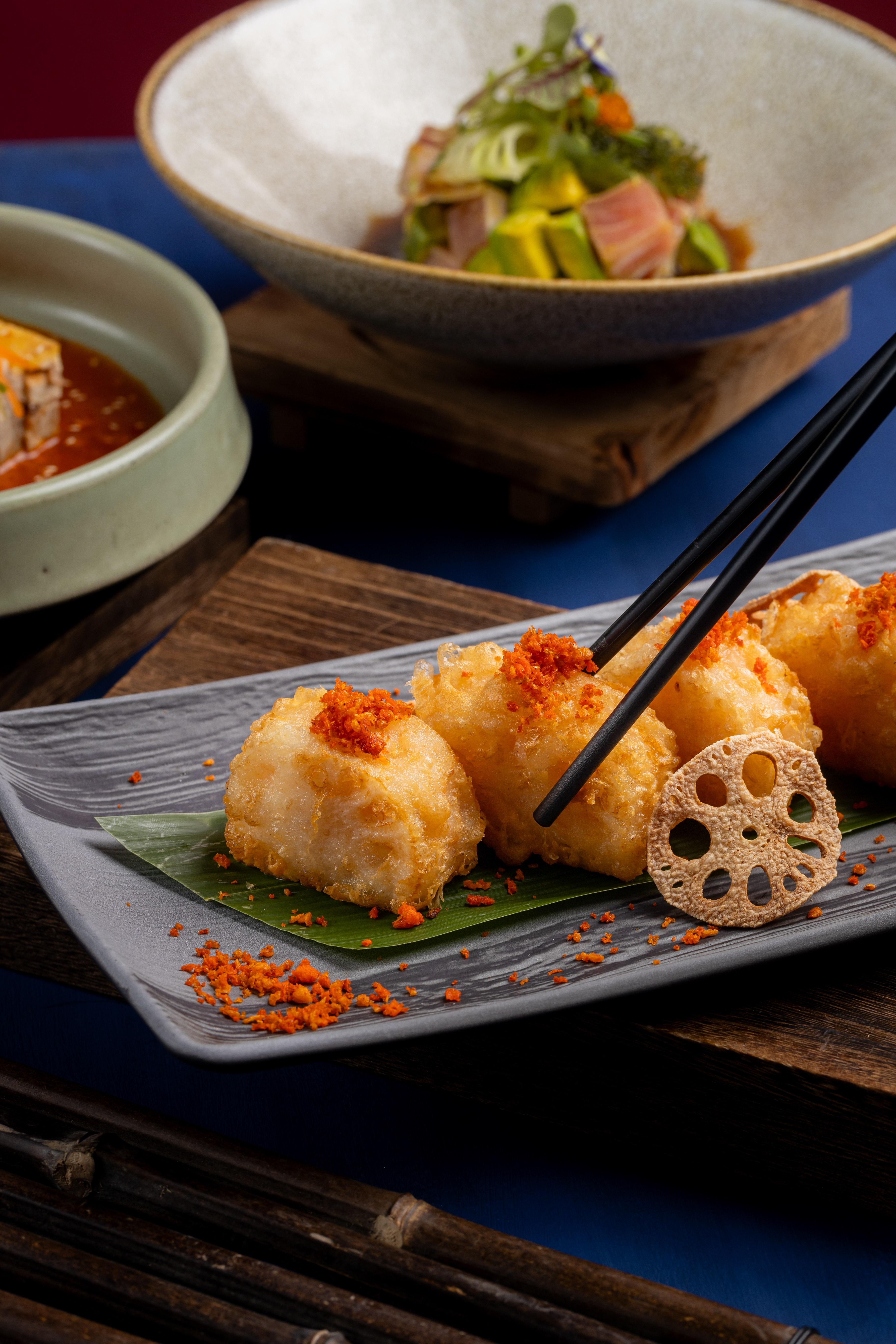 a plate of food with chopsticks