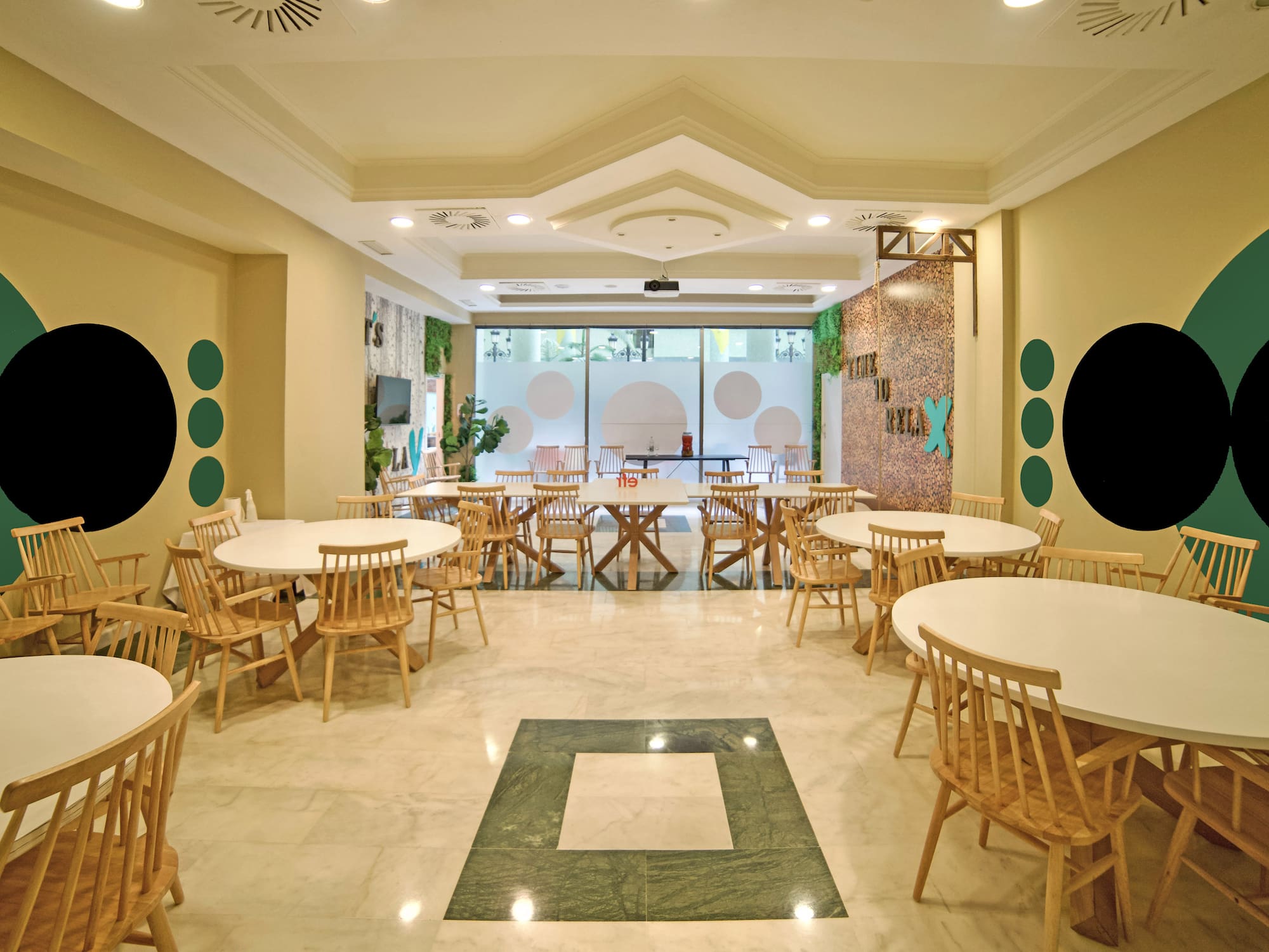 a room with tables and chairs