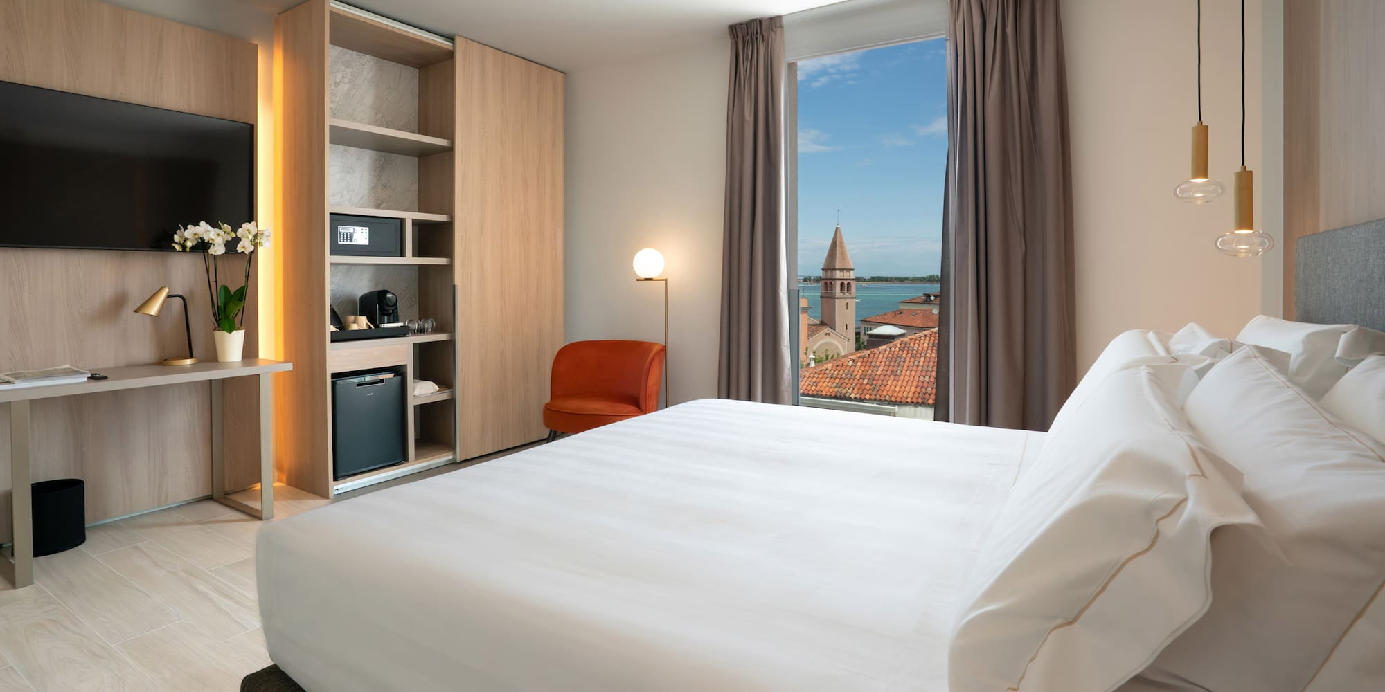 a room with a bed and a window