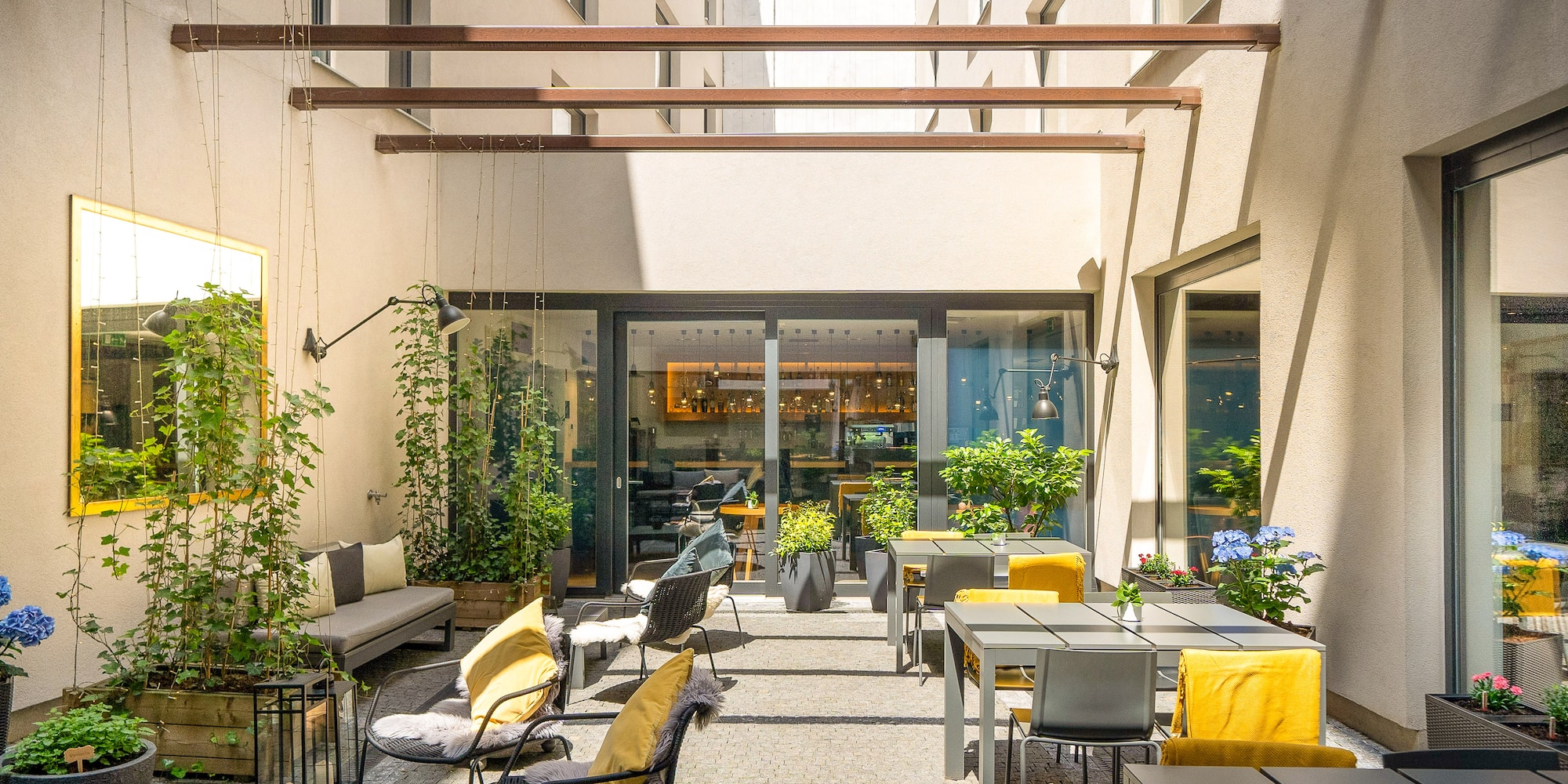 a patio area with tables and chairs