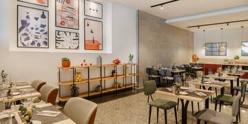 a room with tables and chairs