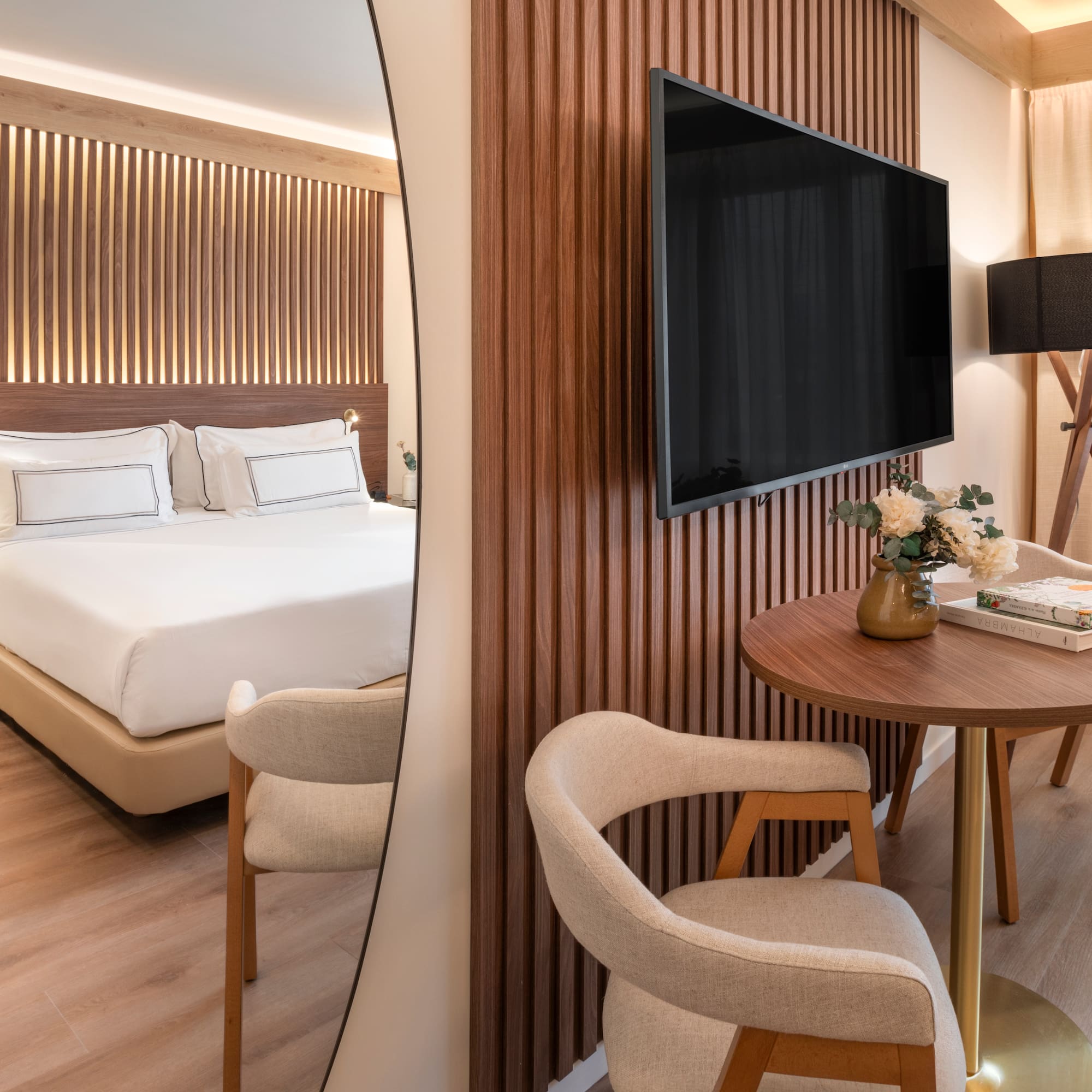 a mirror of a hotel room