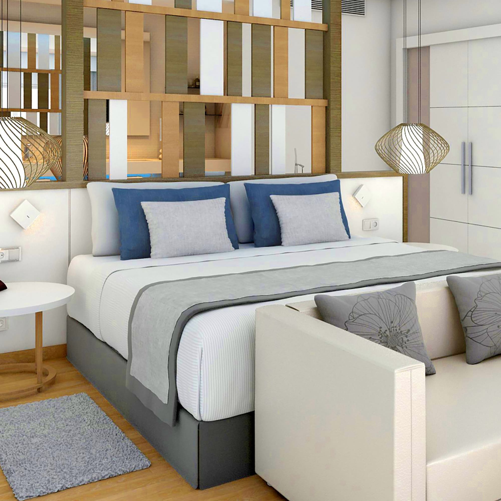 a bed with a white couch and a white table