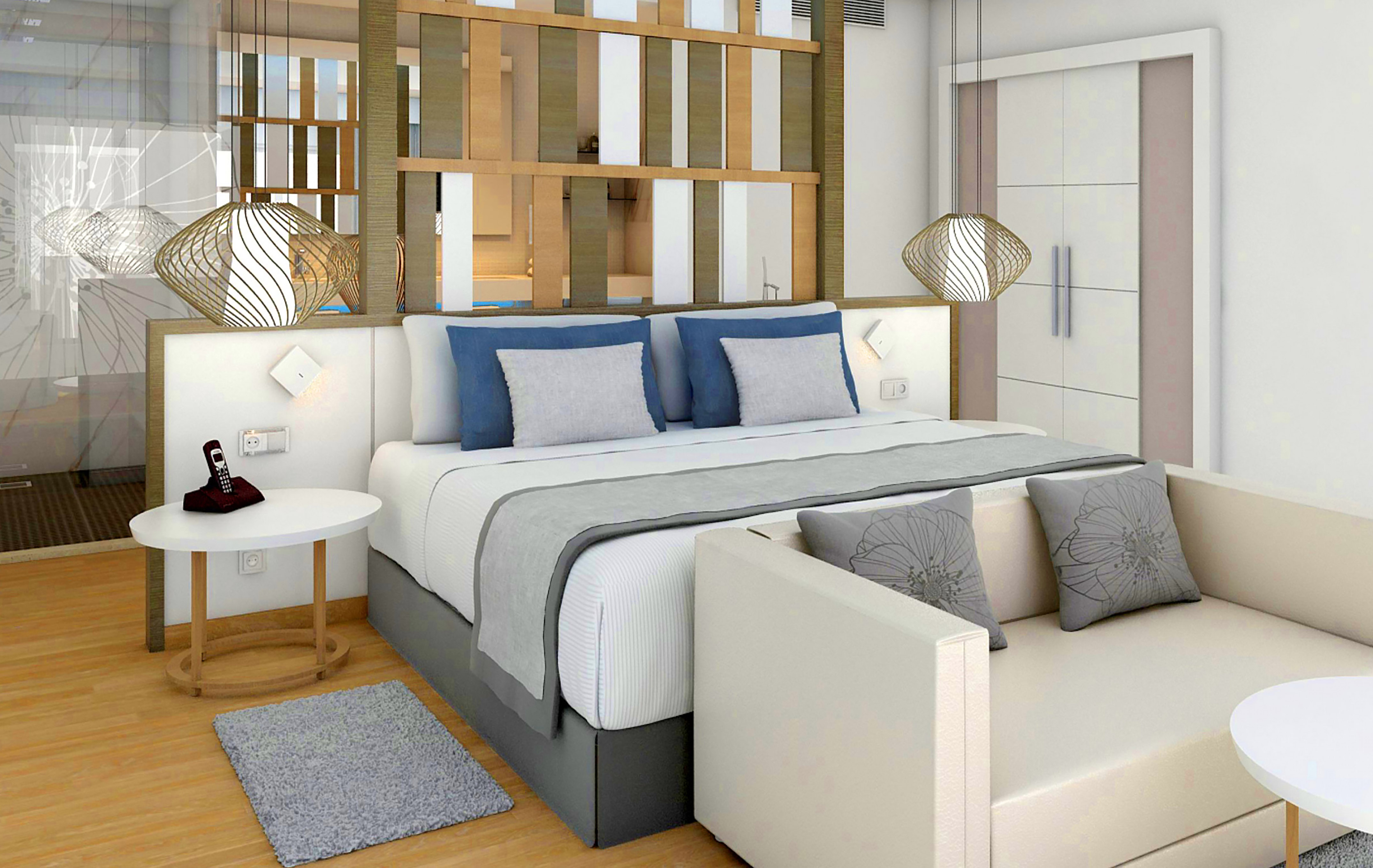 a bed with a white couch and a white table