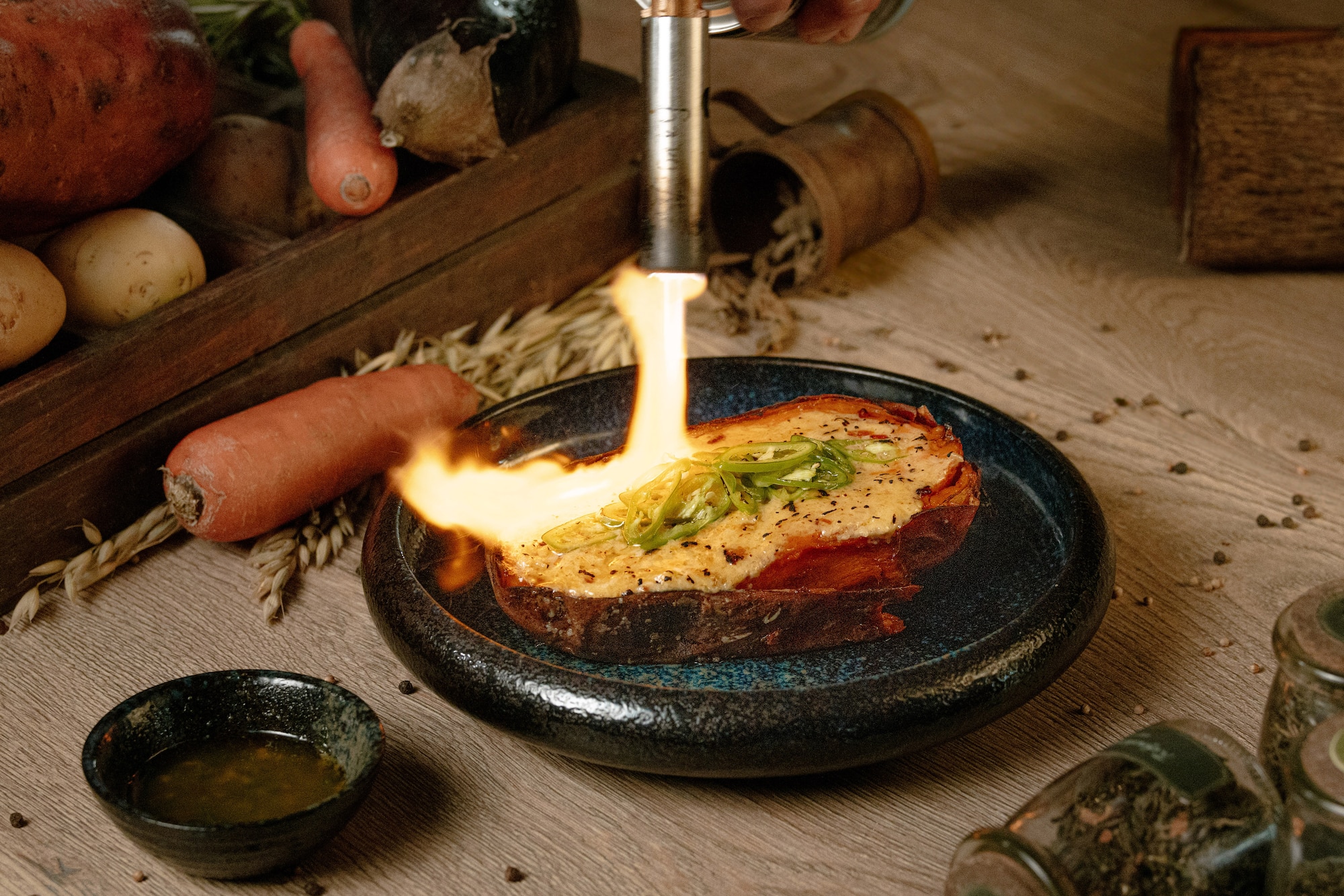 a person lighting up food on a plate