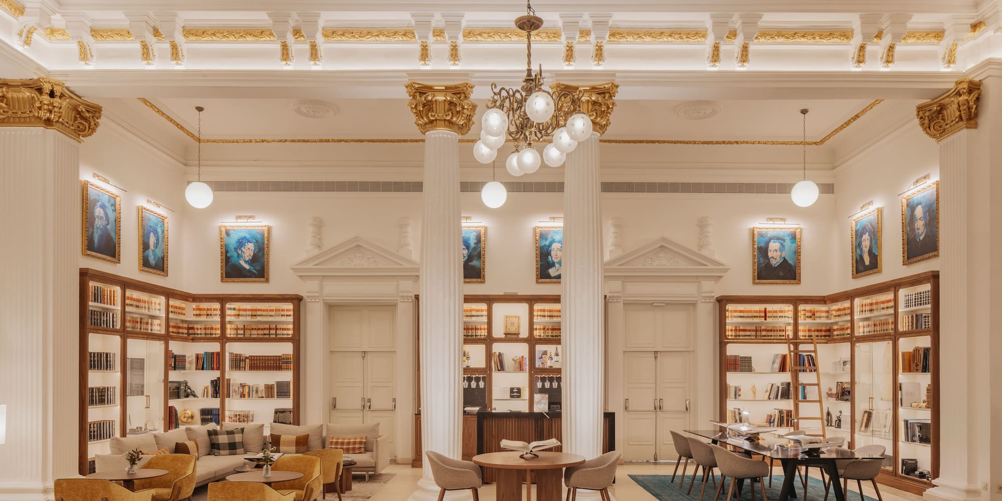 a room with a library and bookshelves