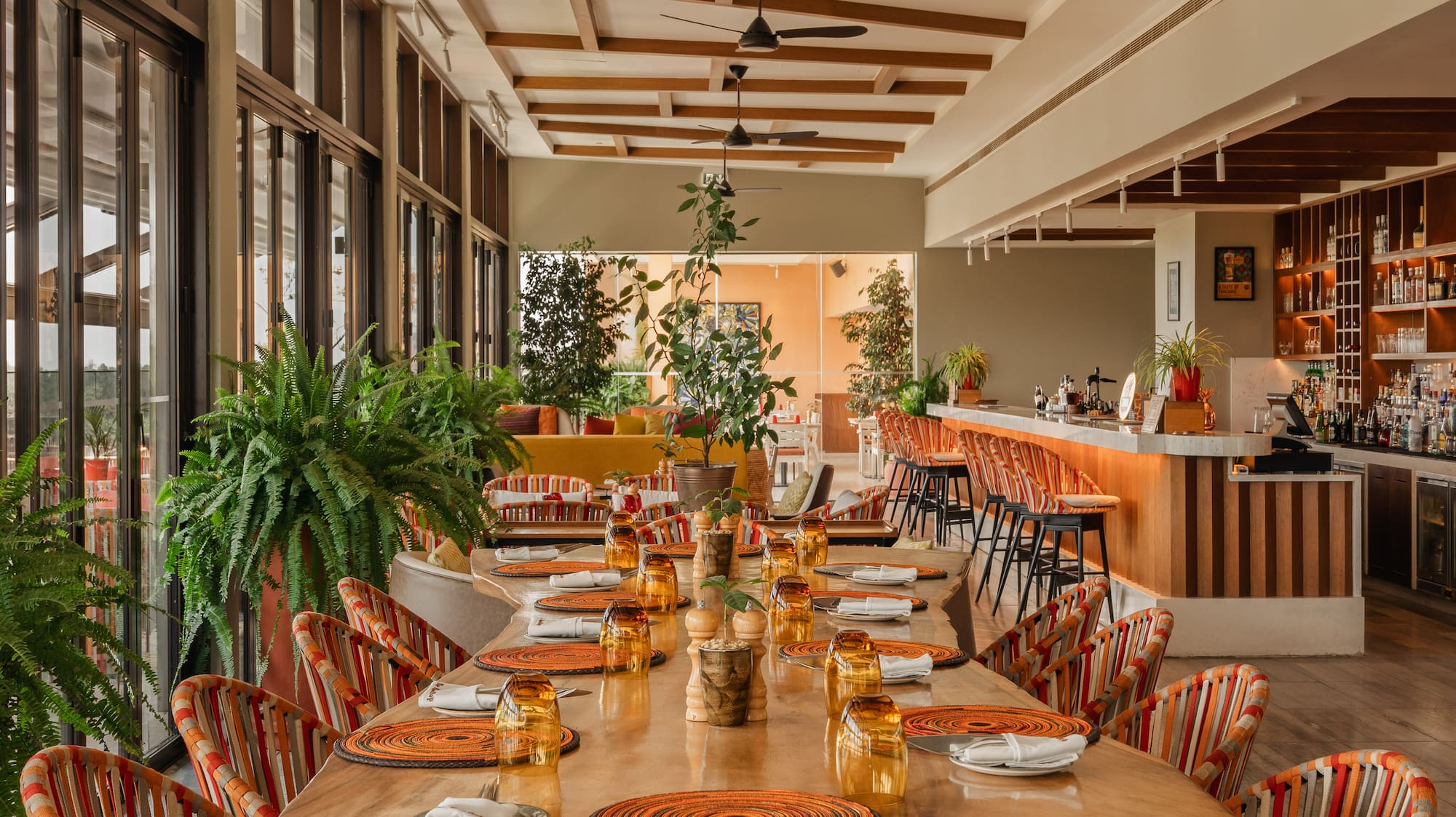 a restaurant with tables and chairs