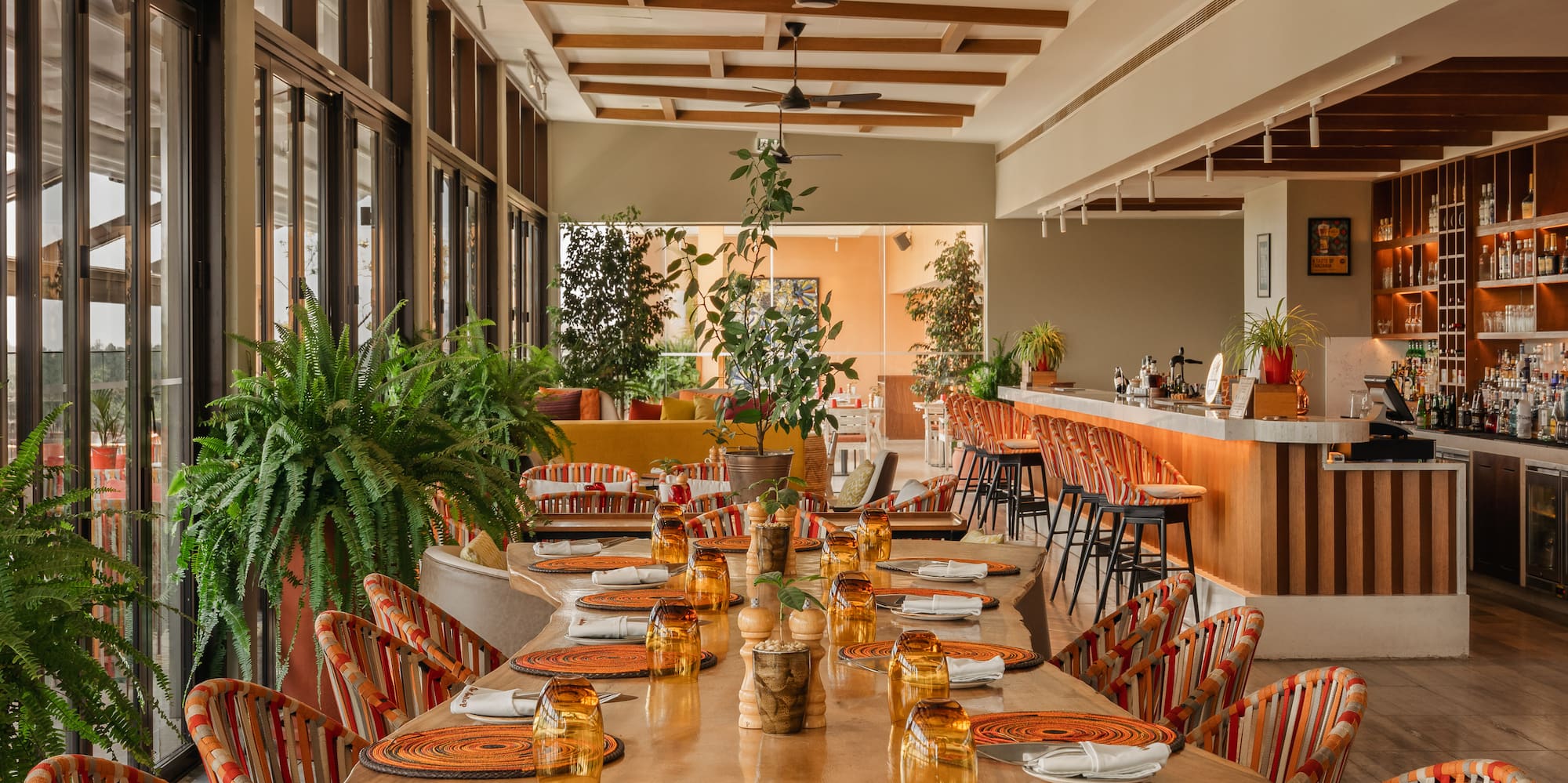 a restaurant with tables and chairs
