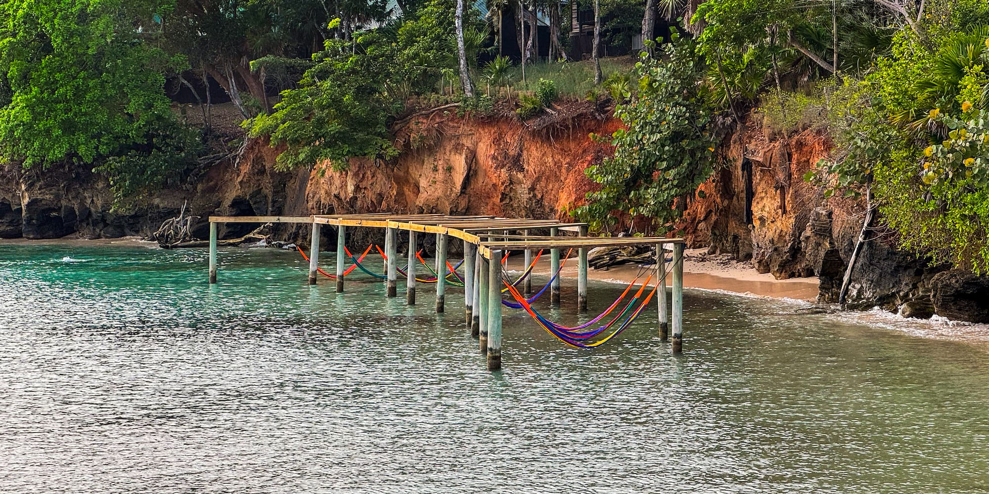 a dock over water with ropes and ropes attached to it