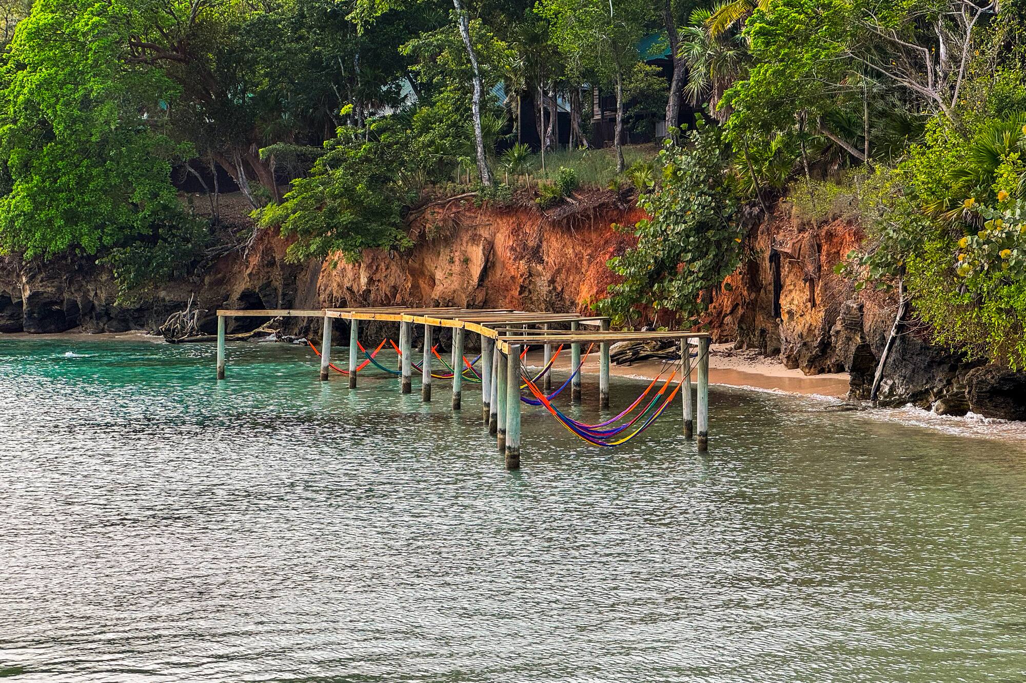 a dock over water with ropes and ropes attached to it