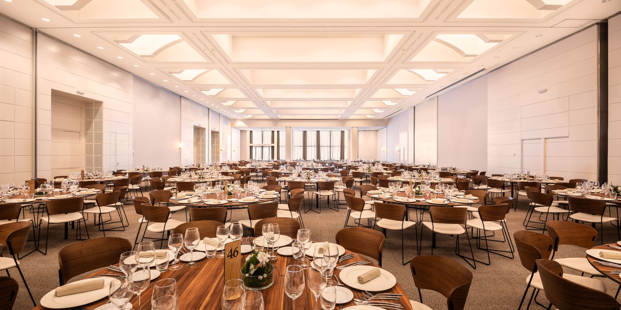 a large room with tables and chairs