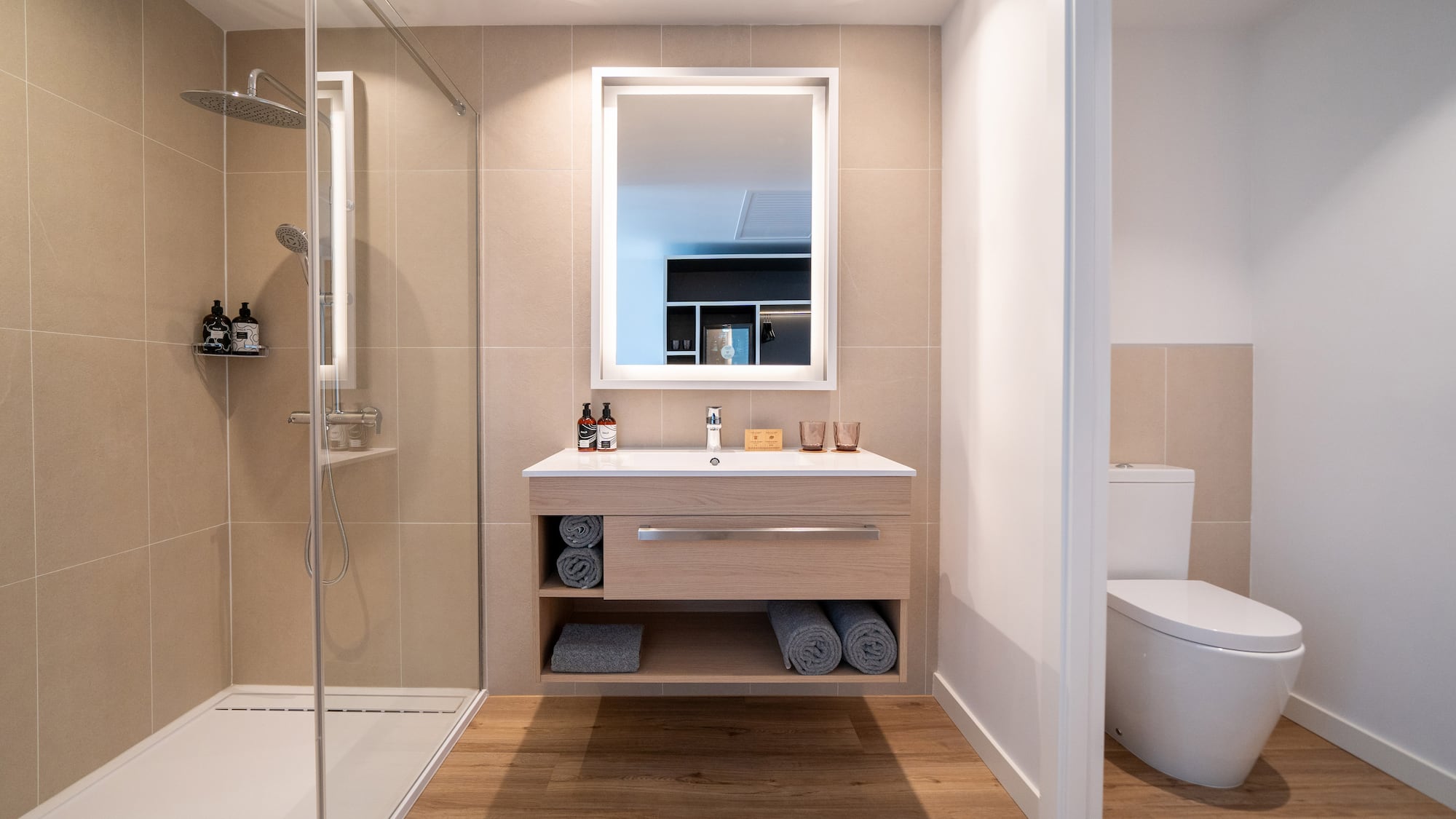 a bathroom with a shower and a sink