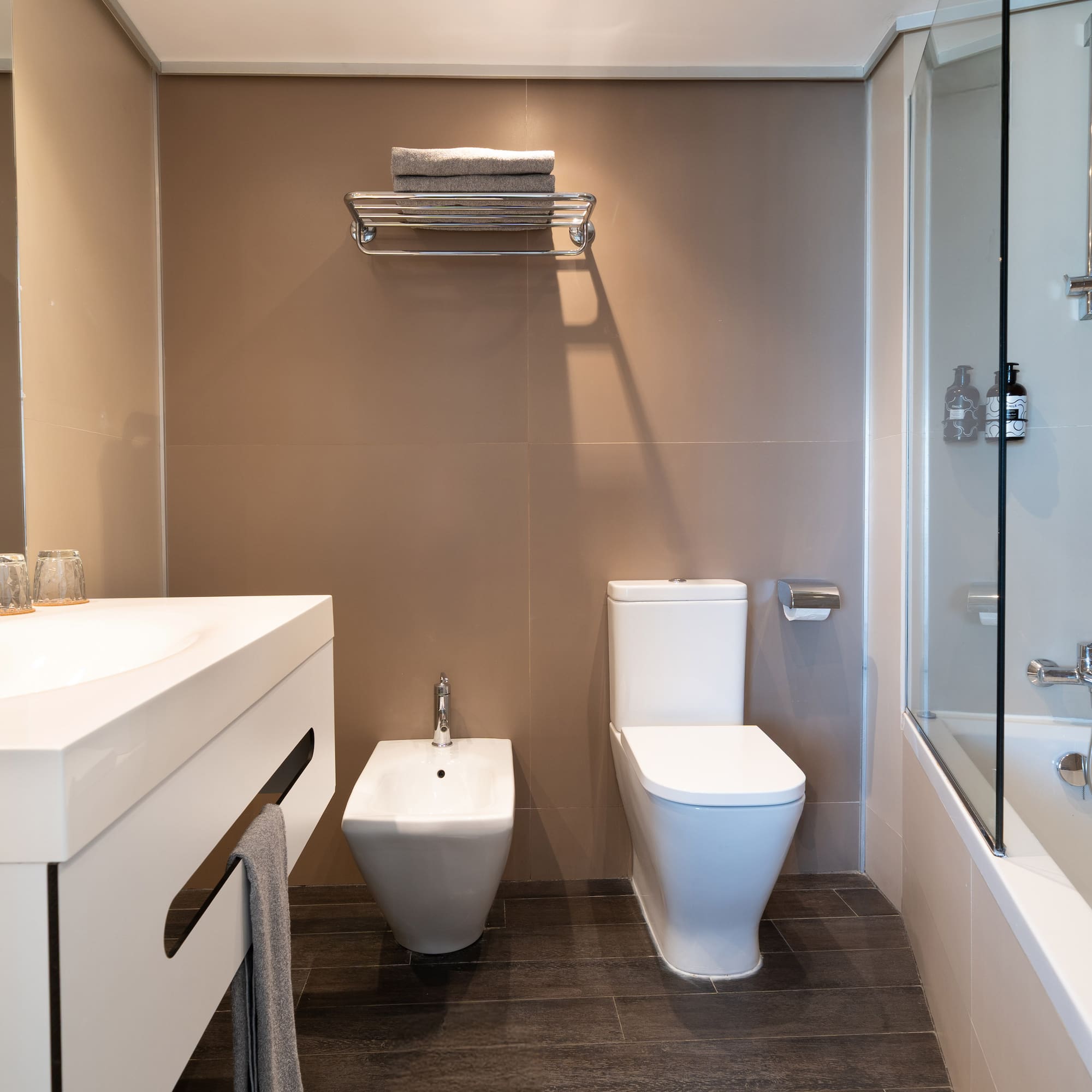 a bathroom with a sink and toilet