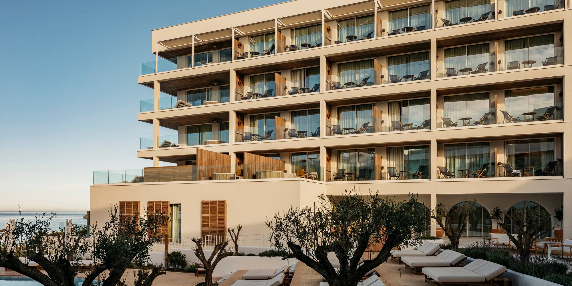a building with many windows and a courtyard