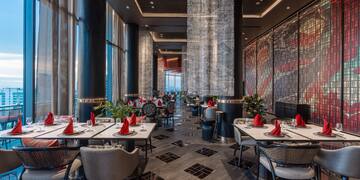 a restaurant with tables and chairs