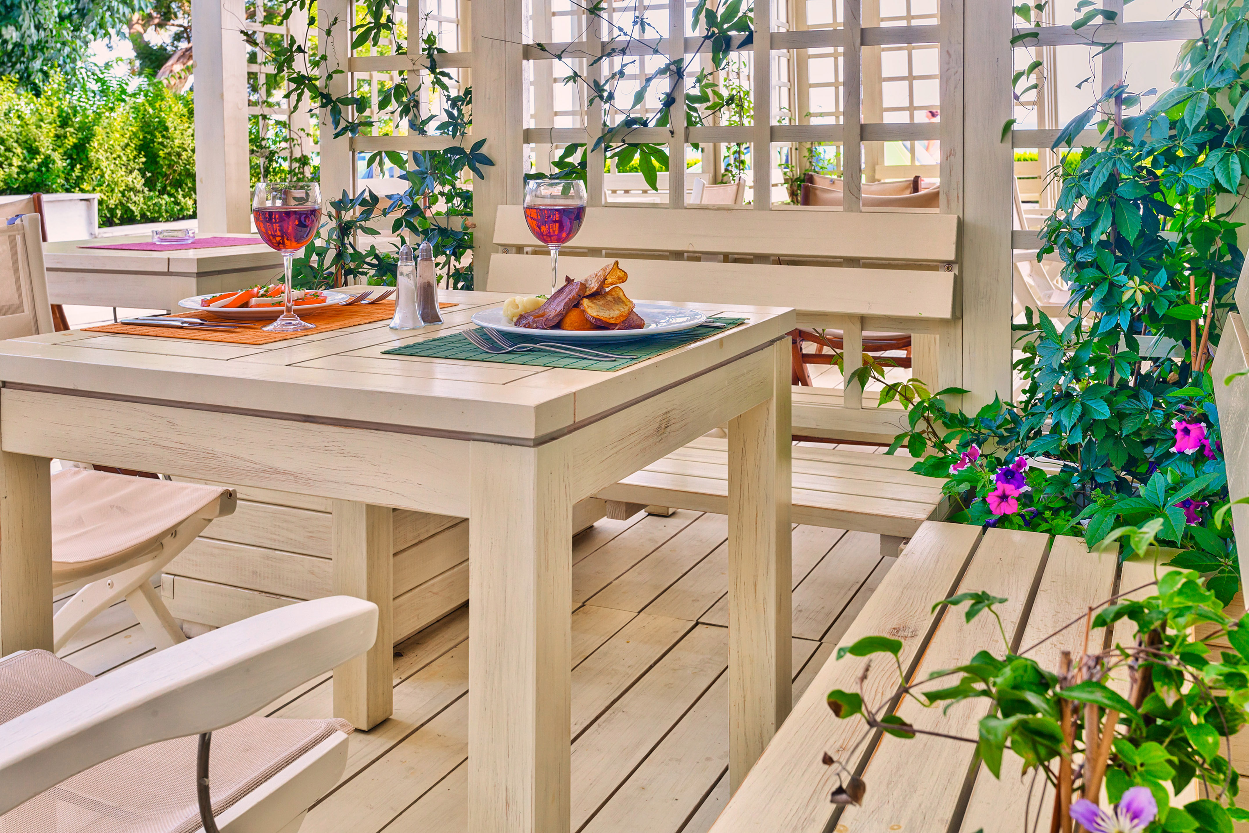 a table with food on it and a glass of wine on it