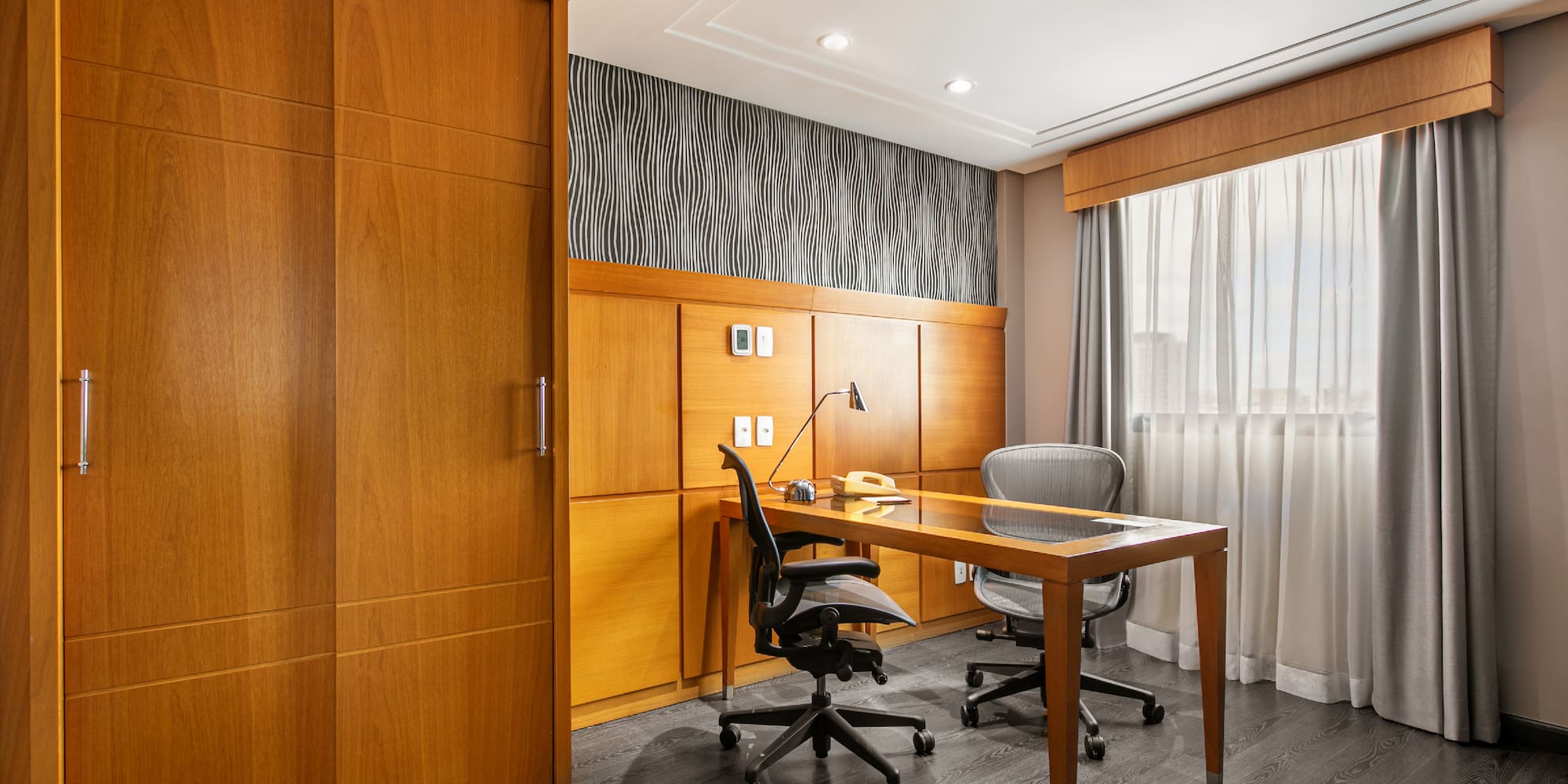 a desk and chair in a room