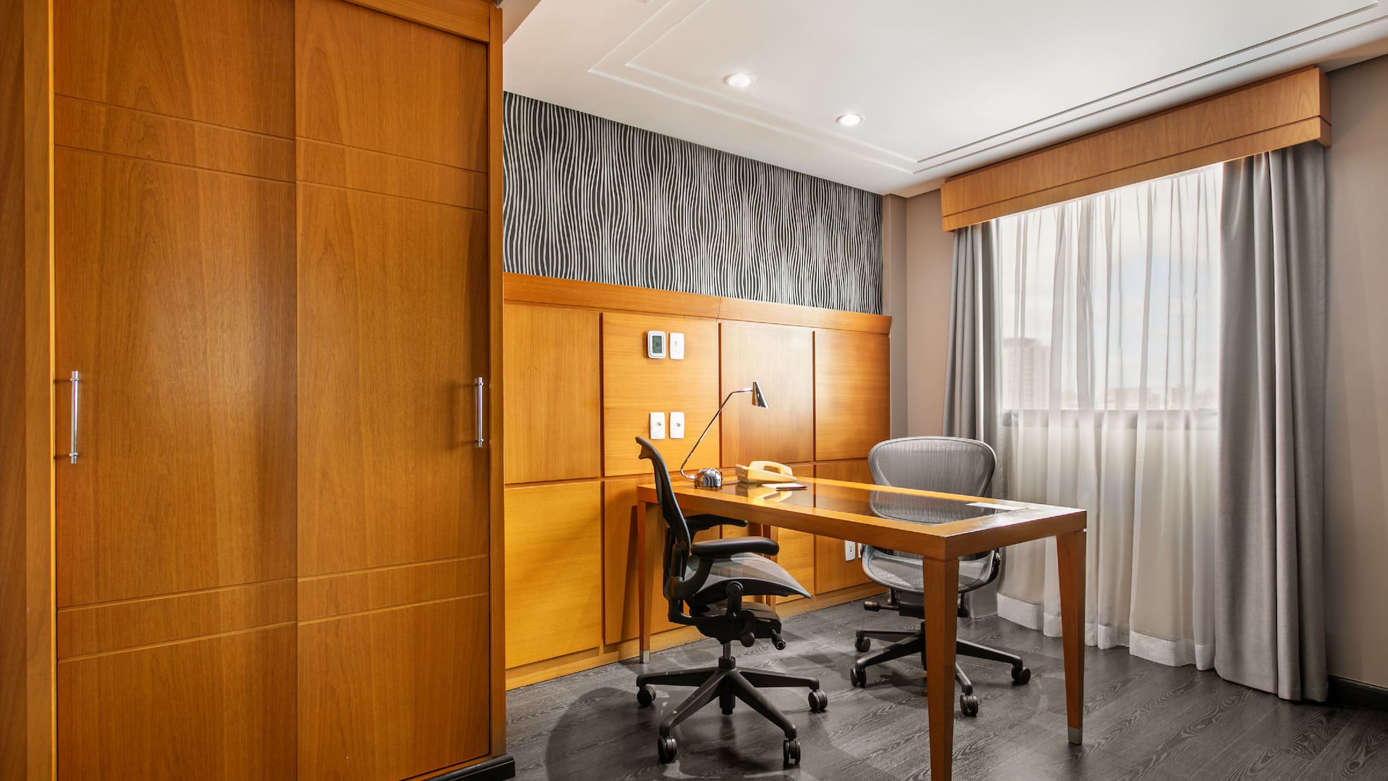 a desk and chair in a room