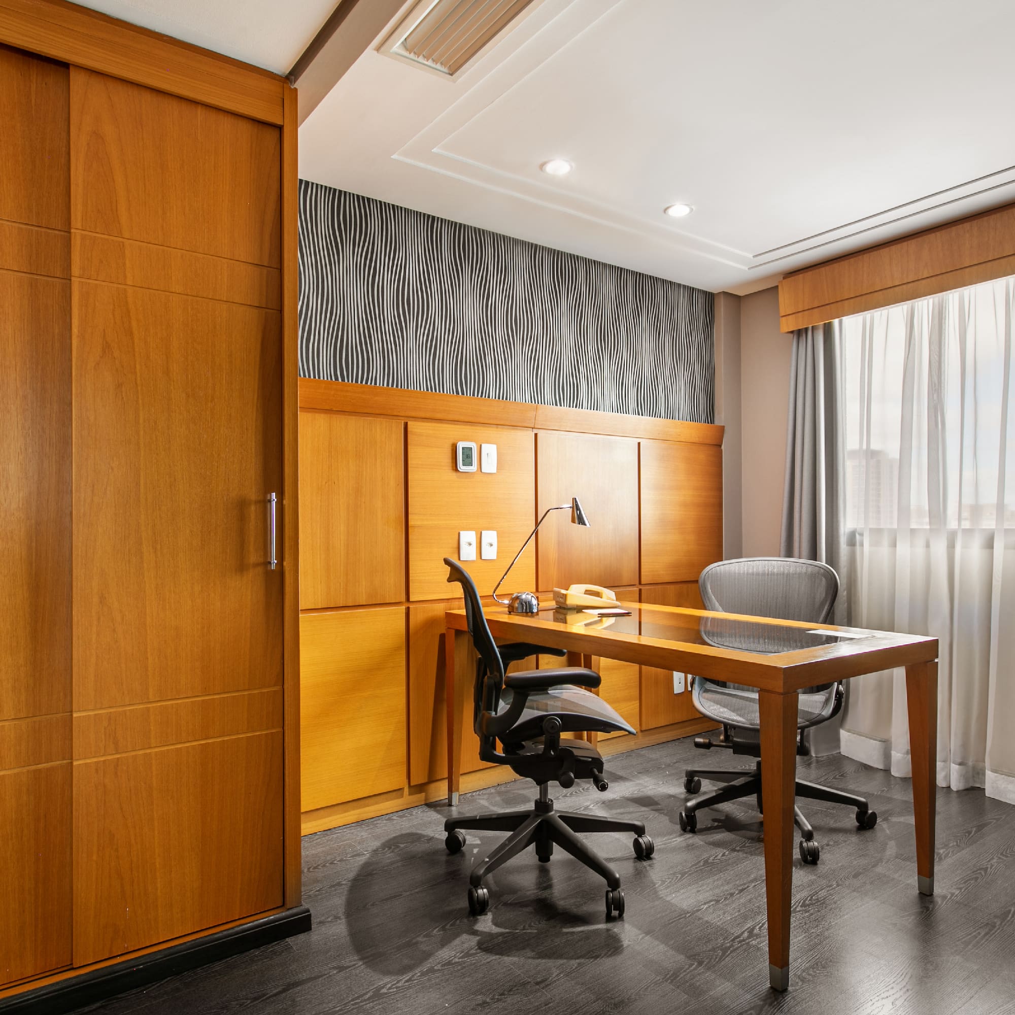 a desk and chair in a room