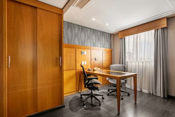 a desk and chair in a room