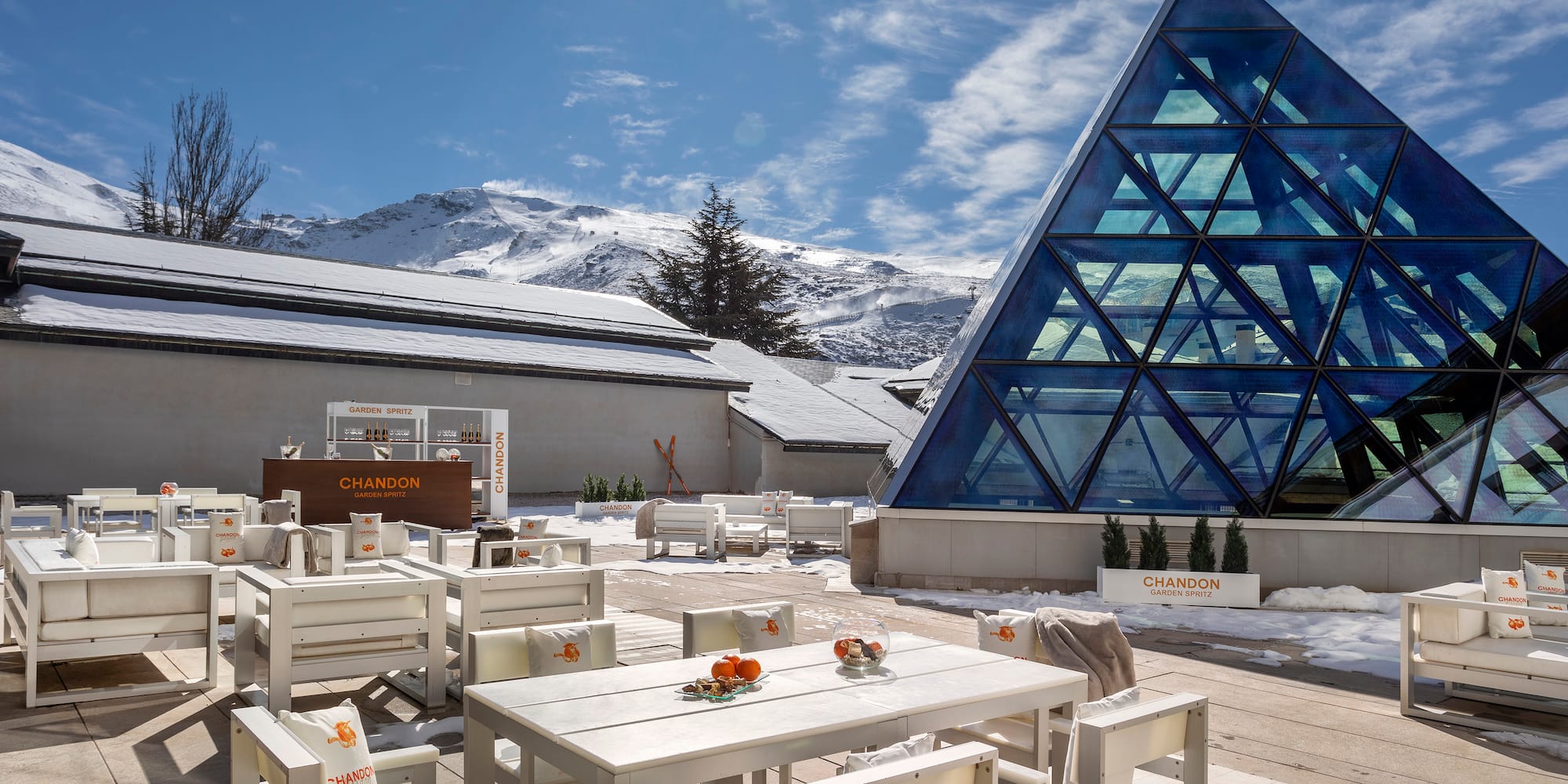 a building with a pyramid shaped glass structure