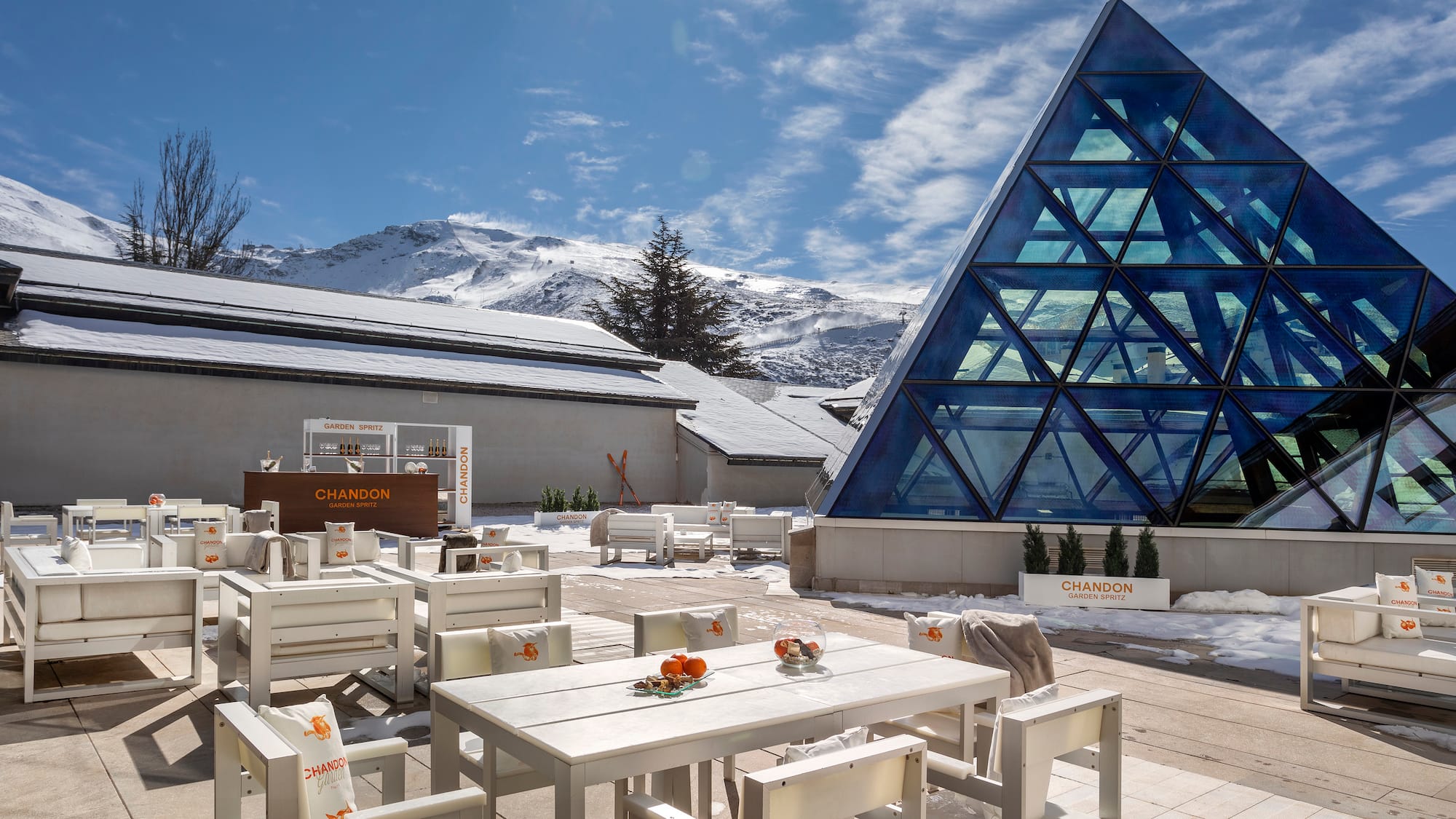 a building with a pyramid shaped glass structure