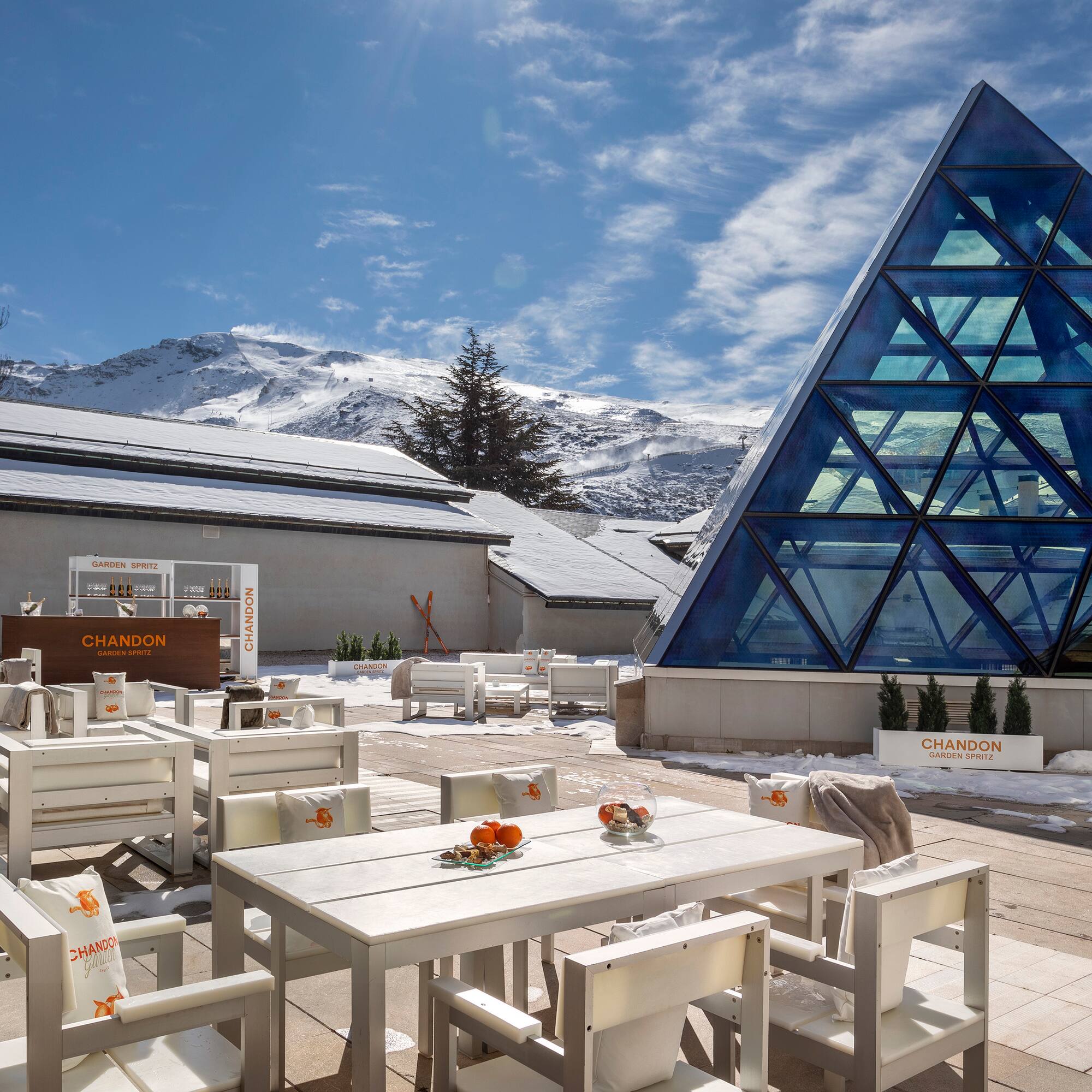 a building with a pyramid shaped glass structure