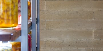 a shelf with jars of food