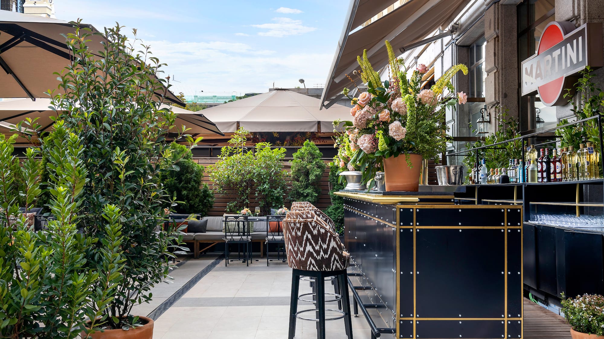 a bar with plants on the side