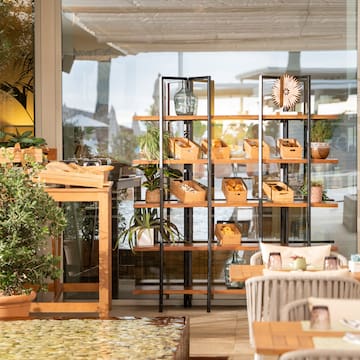 a restaurant with tables and chairs