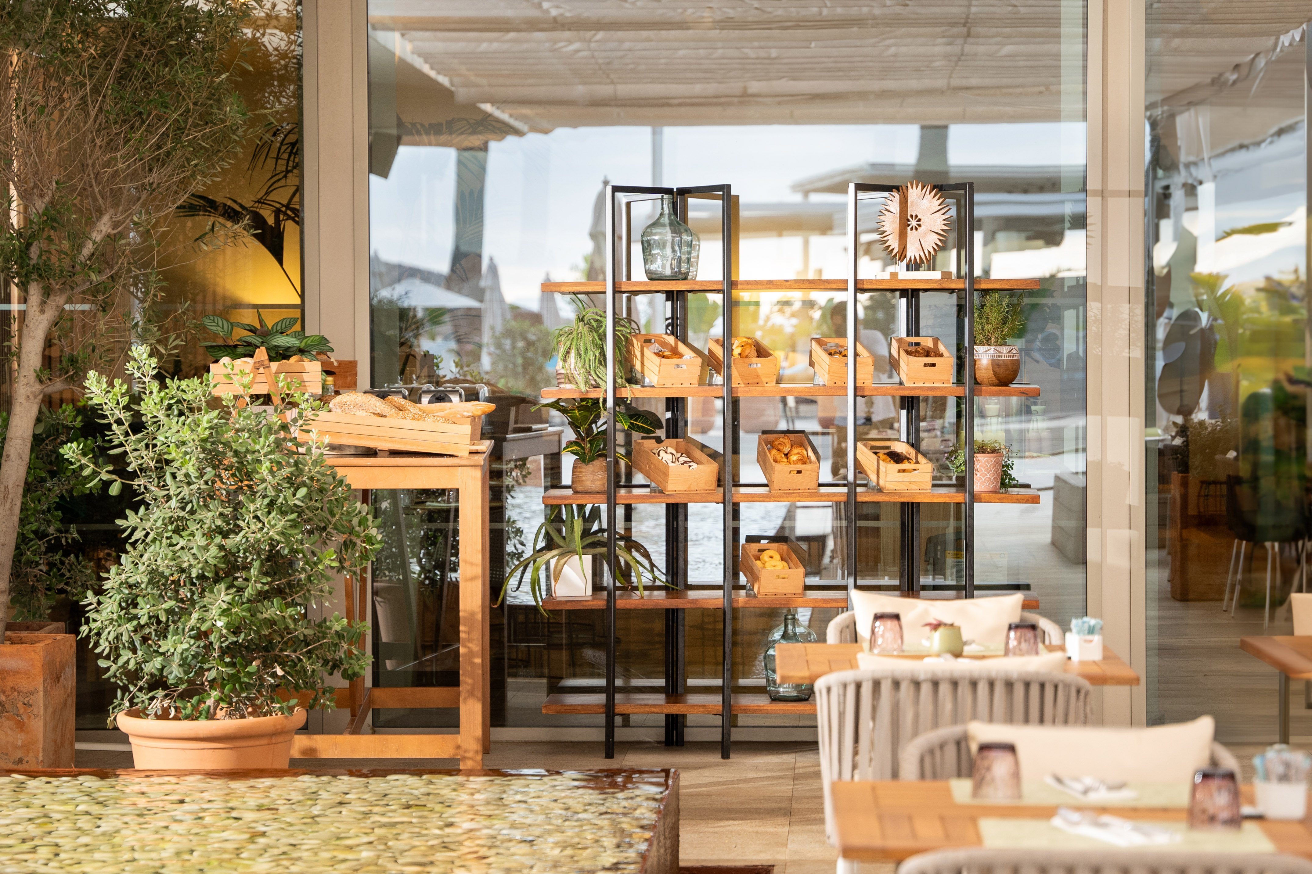 a restaurant with tables and chairs