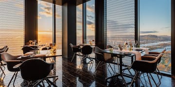 a room with tables and chairs