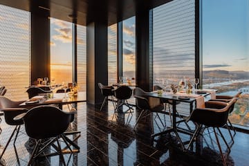 a room with tables and chairs