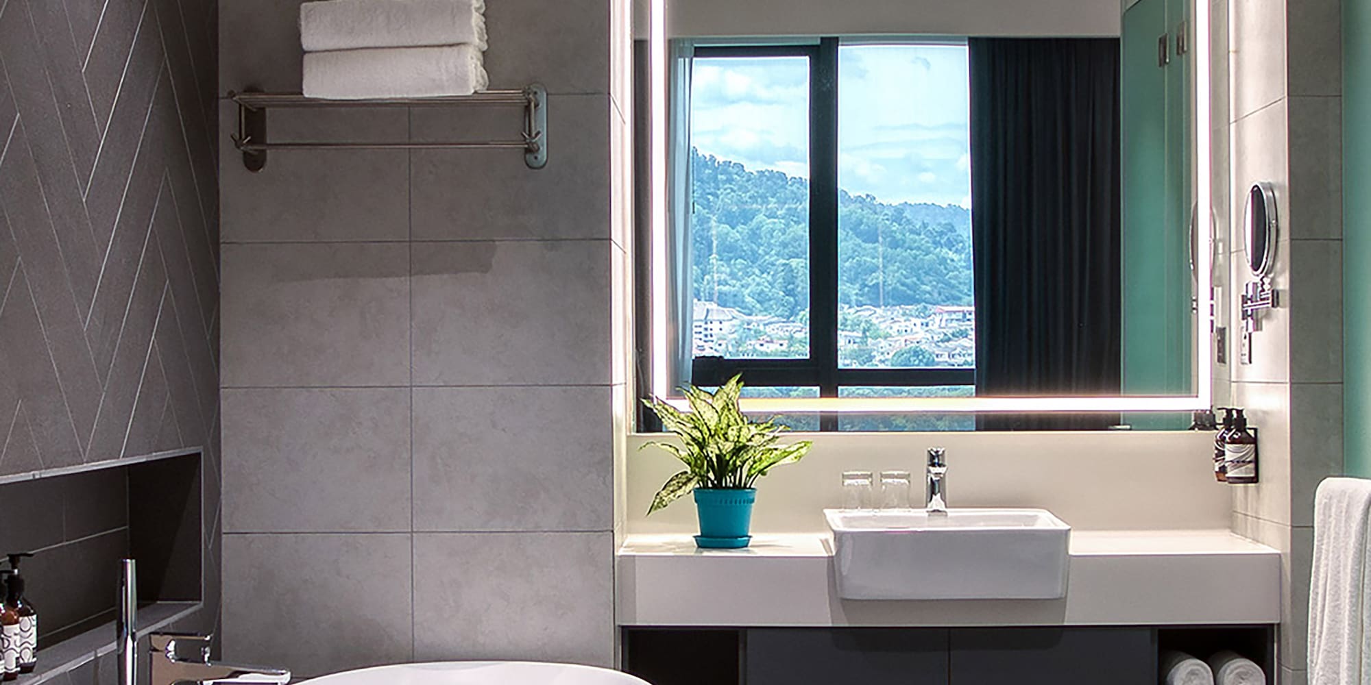 a bathroom with a tub and sink