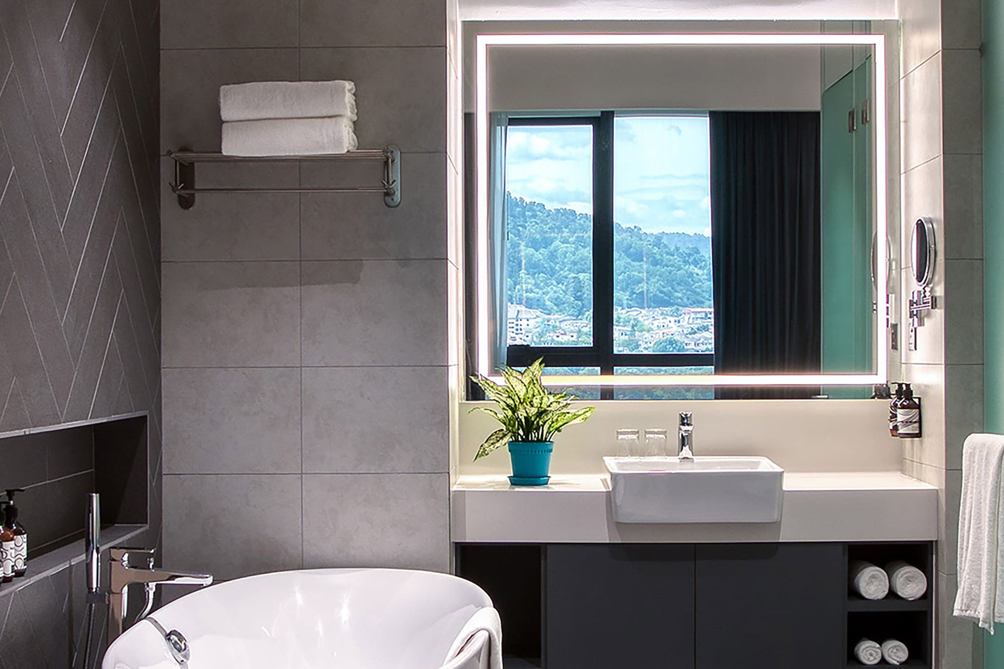 a bathroom with a tub and sink