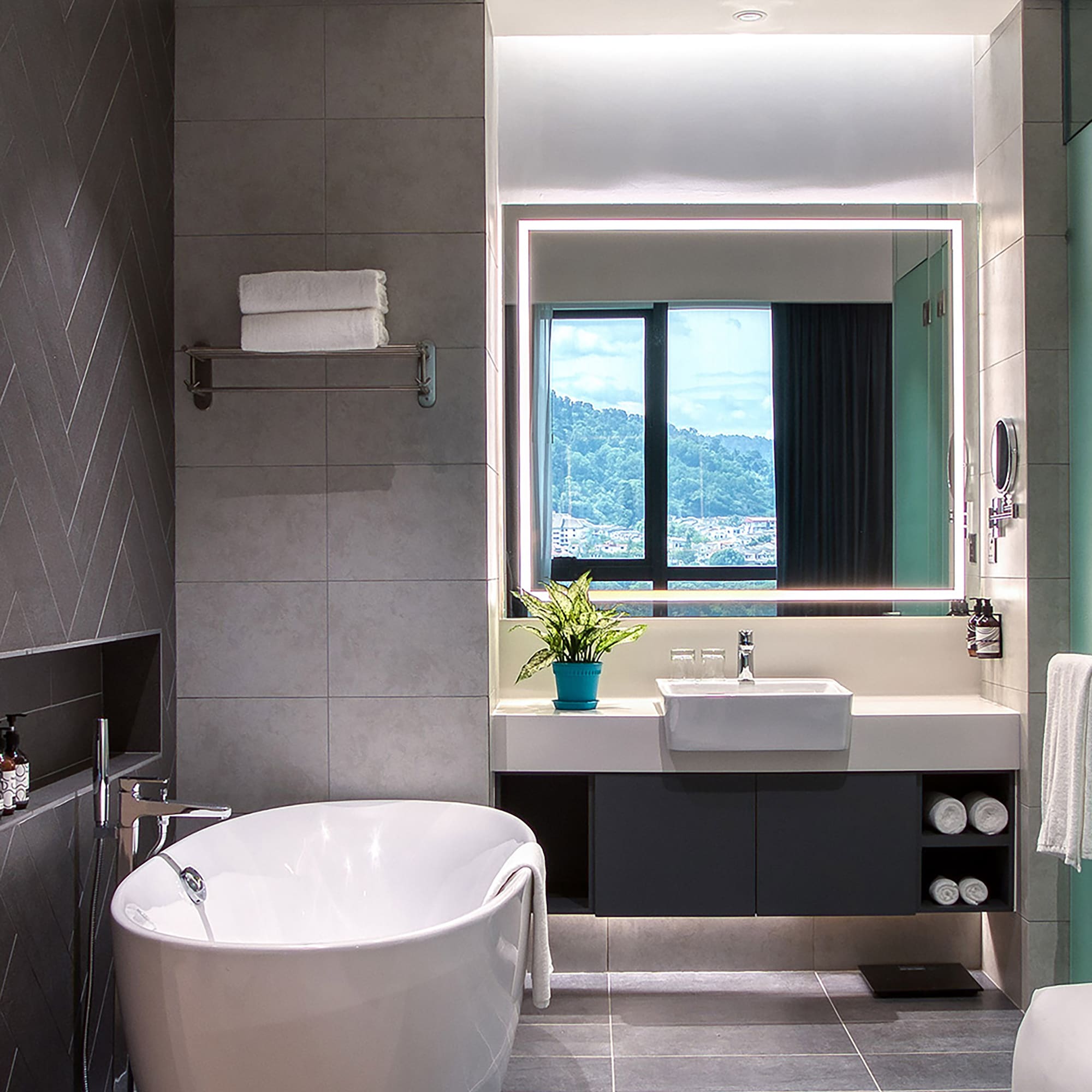 a bathroom with a tub and sink