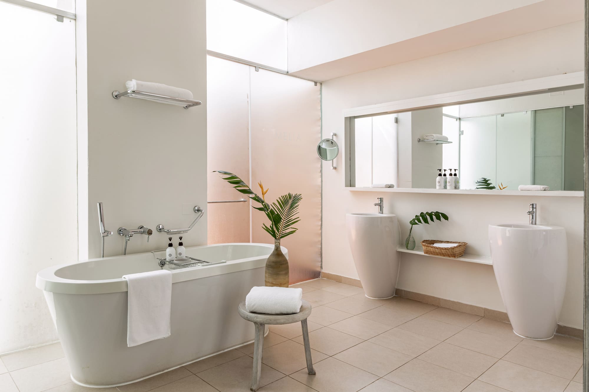 a bathroom with a tub and sink