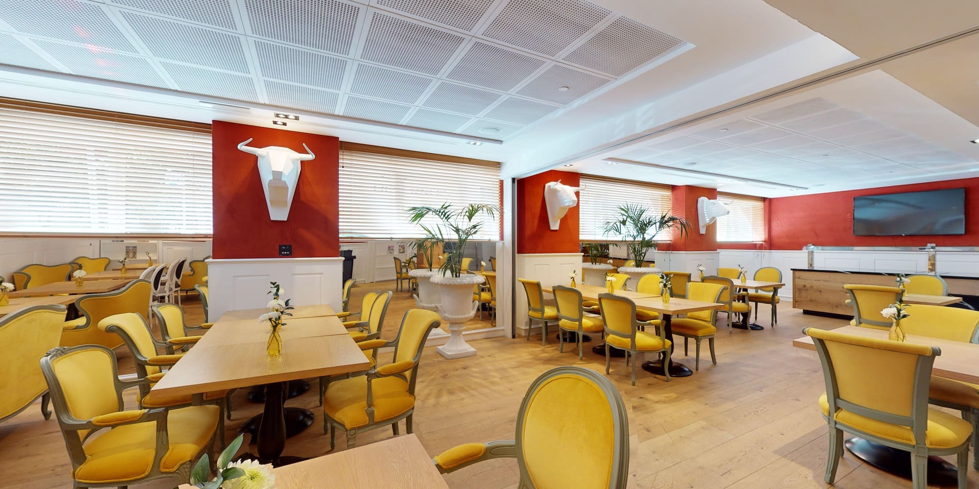 a room with tables and chairs