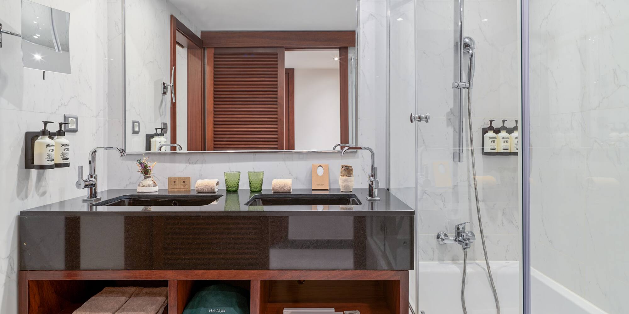 a bathroom with a mirror and a sink