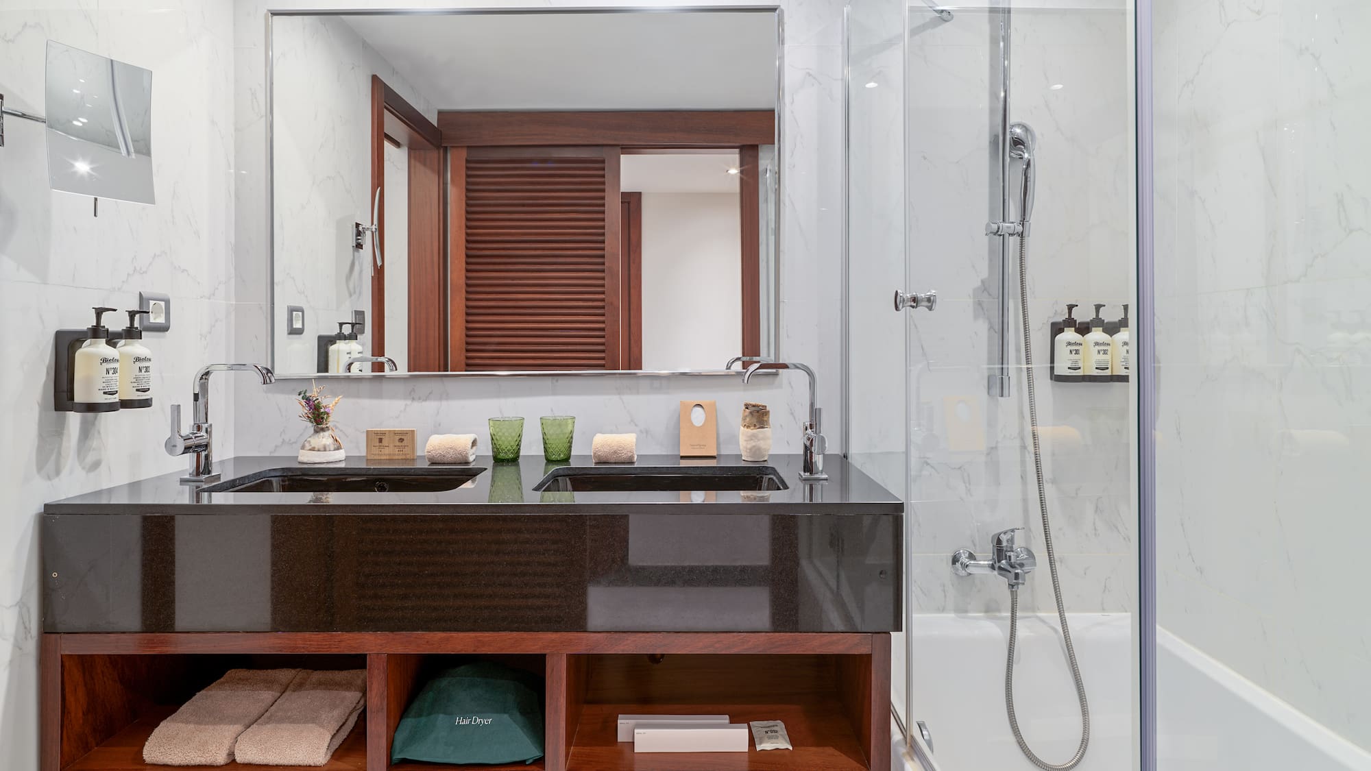 a bathroom with a mirror and a sink