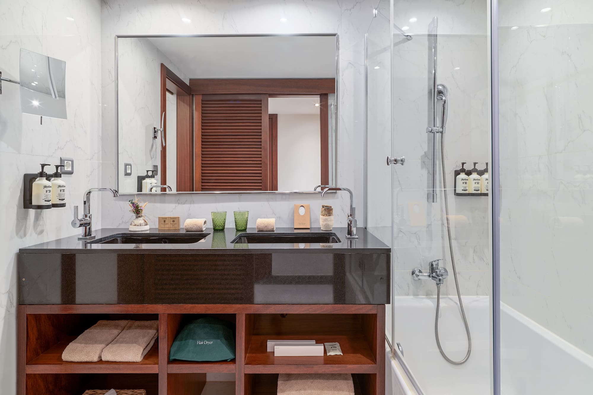 a bathroom with a mirror and a sink