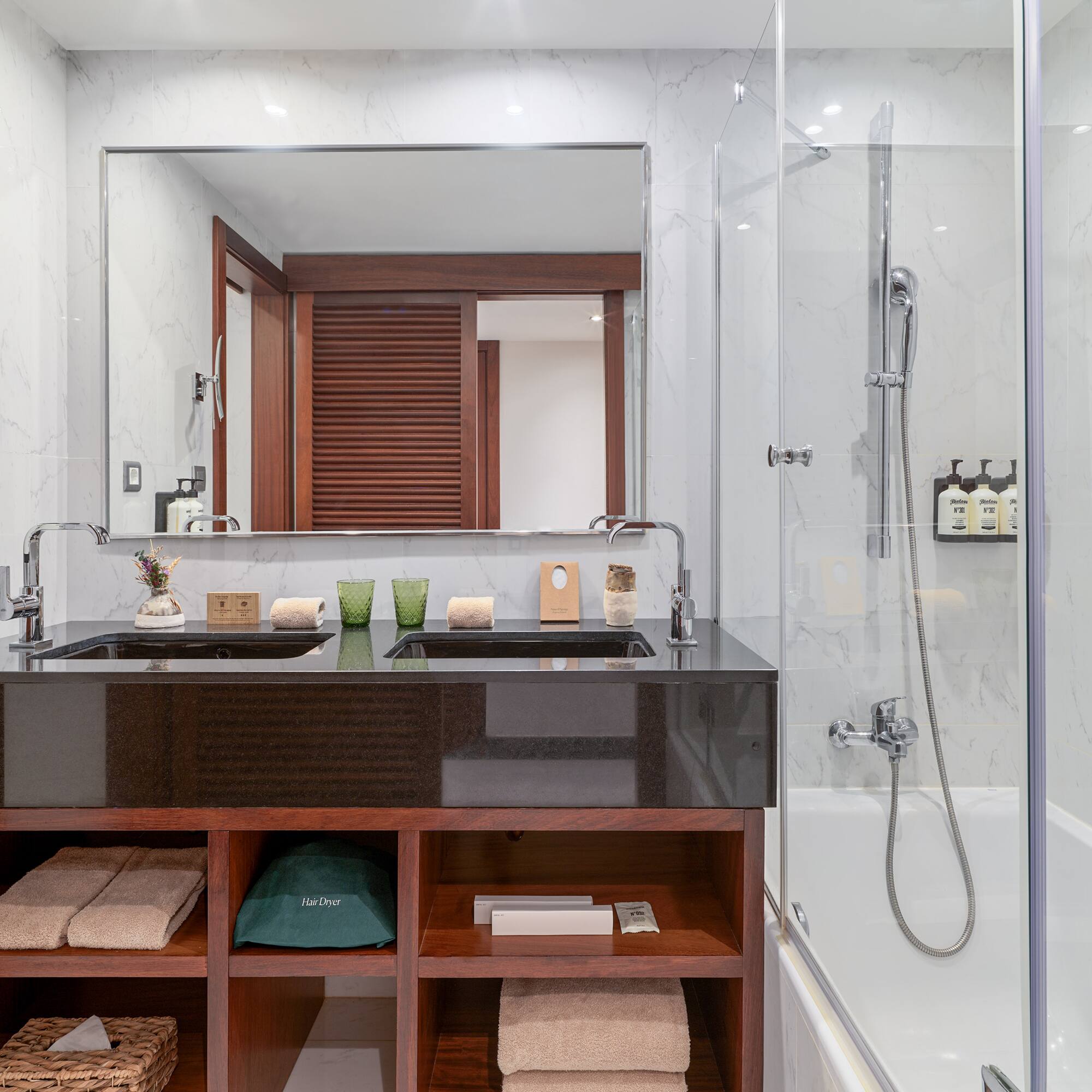 a bathroom with a mirror and a sink