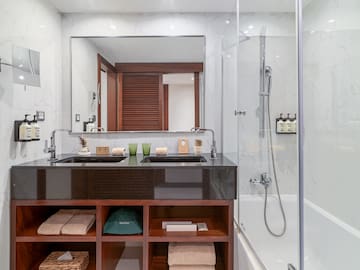 a bathroom with a mirror and a sink