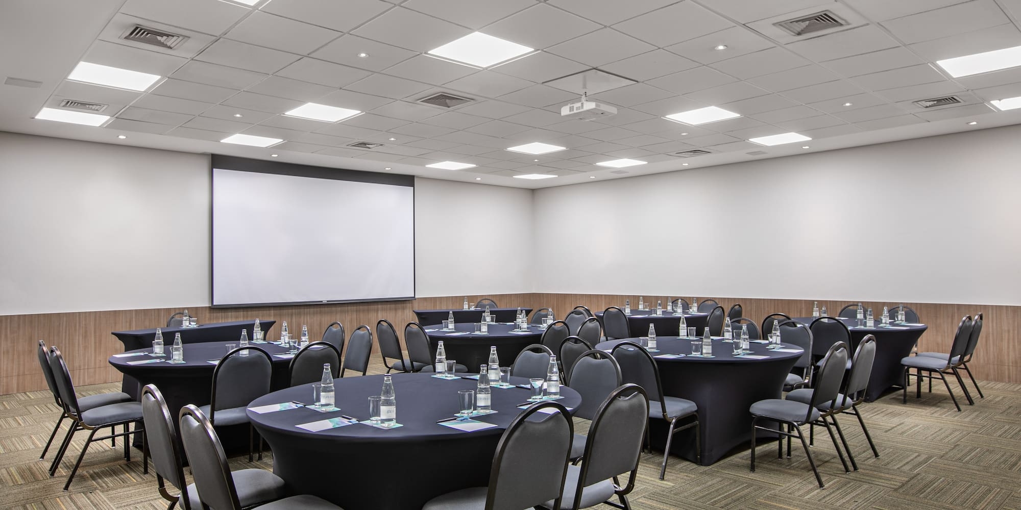 a room with tables and chairs