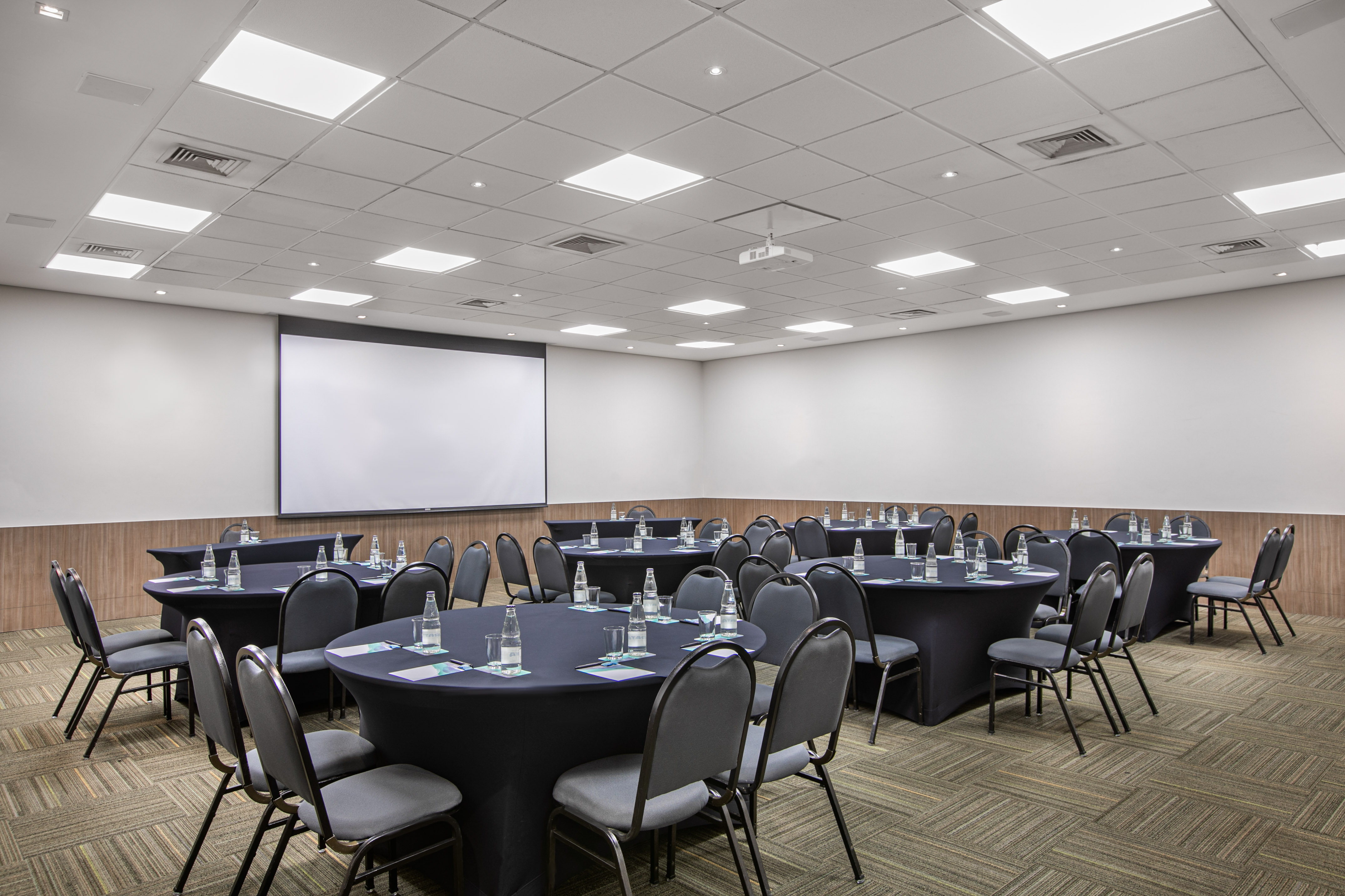 a room with tables and chairs