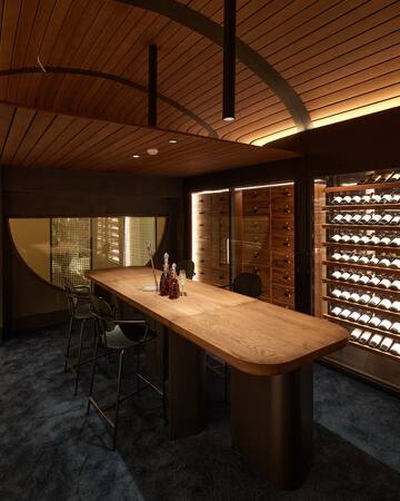 a room with a table and chairs