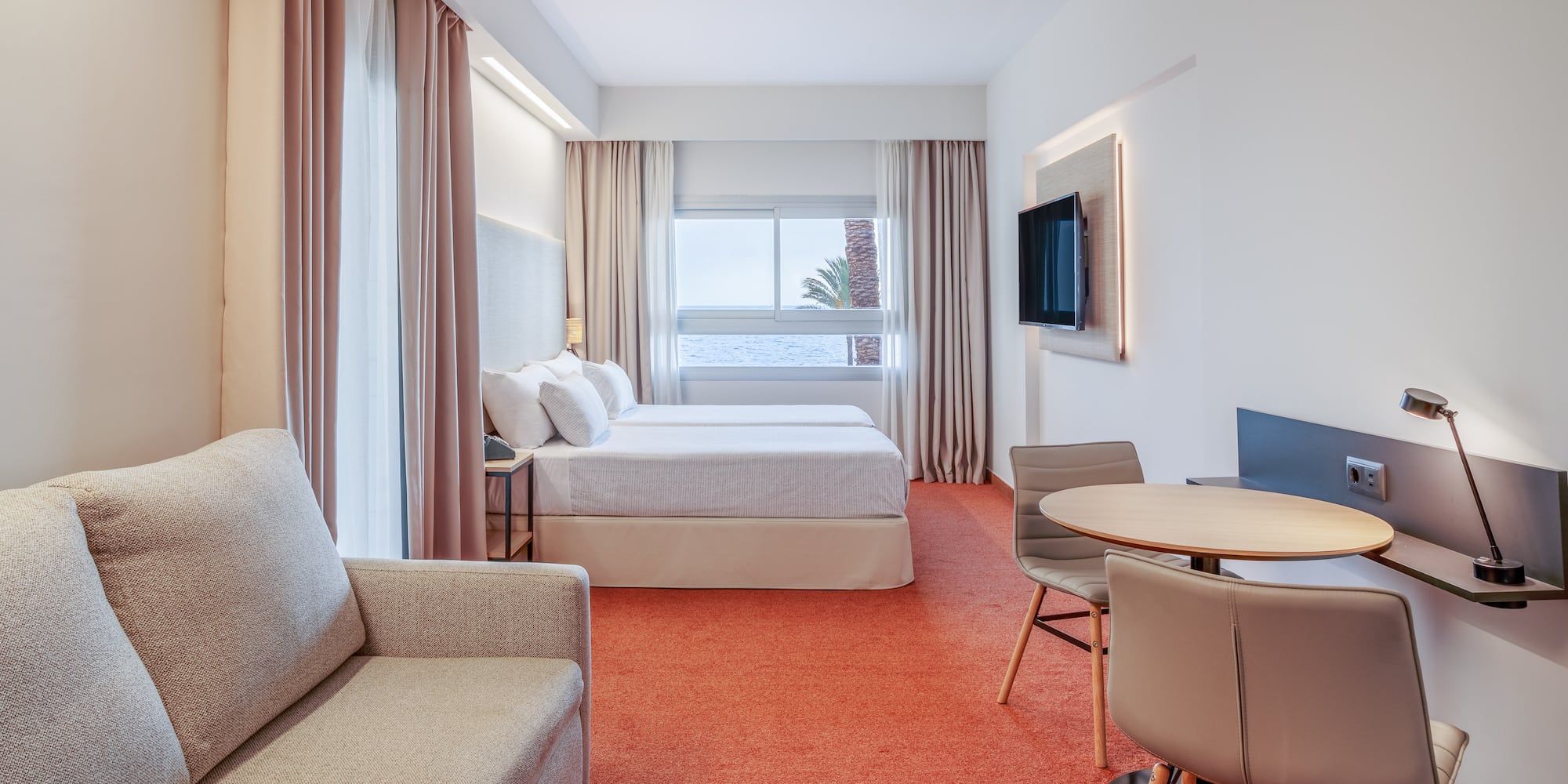 a room with a bed and a table