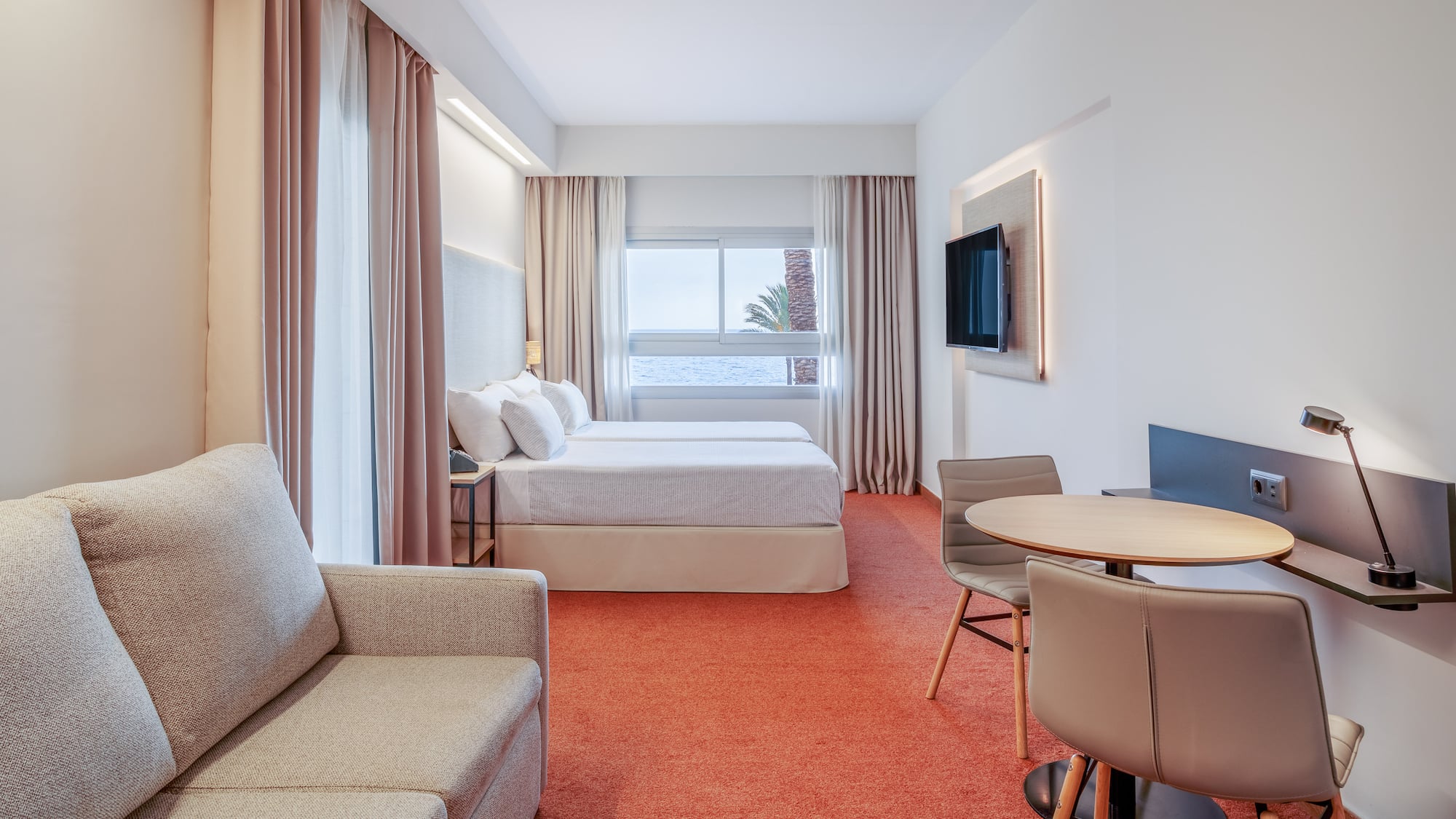 a room with a bed and a table