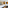 Modern hotel room, white bed, light wood furniture, abstract art.